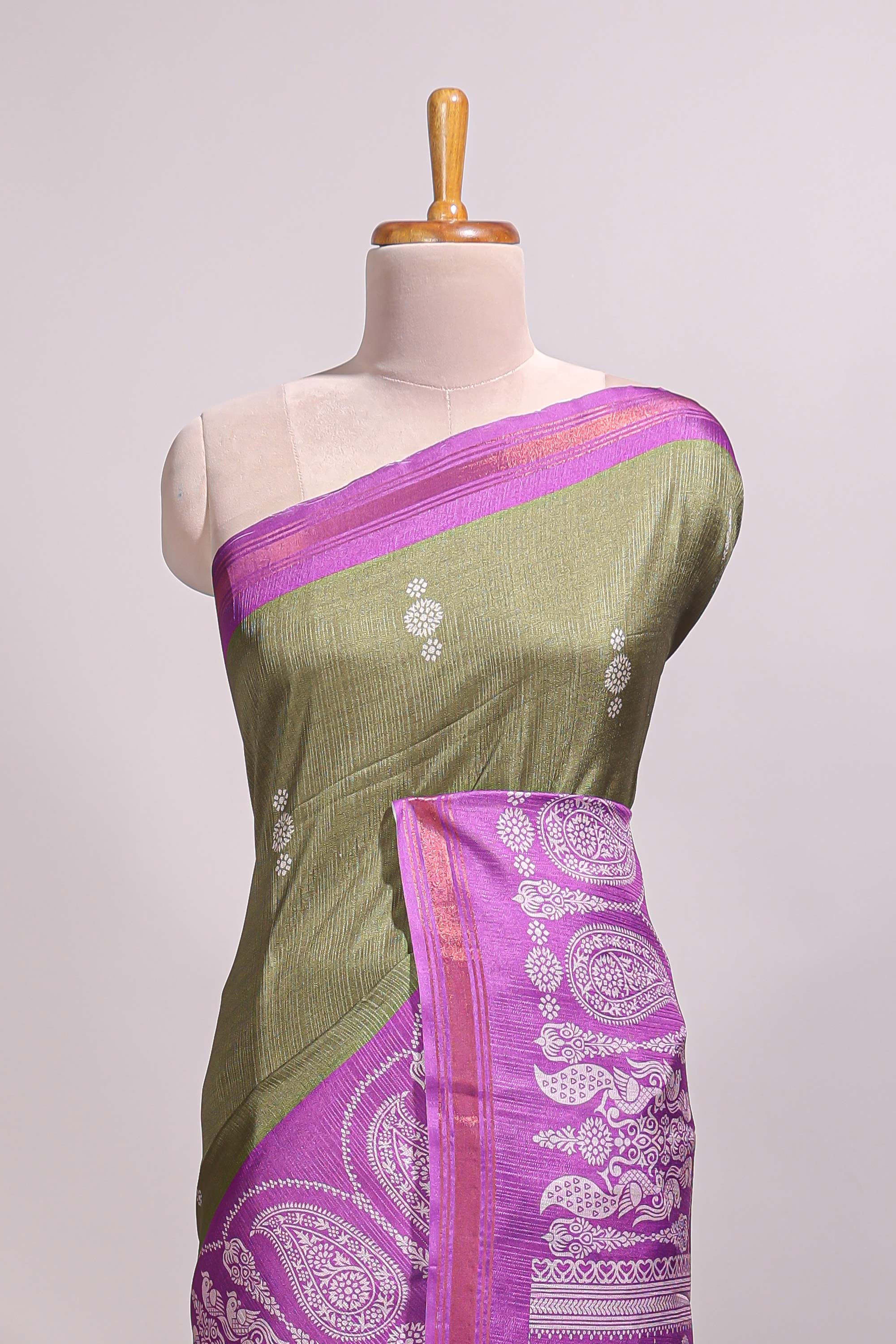 Green floral motifs semi tussar saree with contrast border and printed blouse