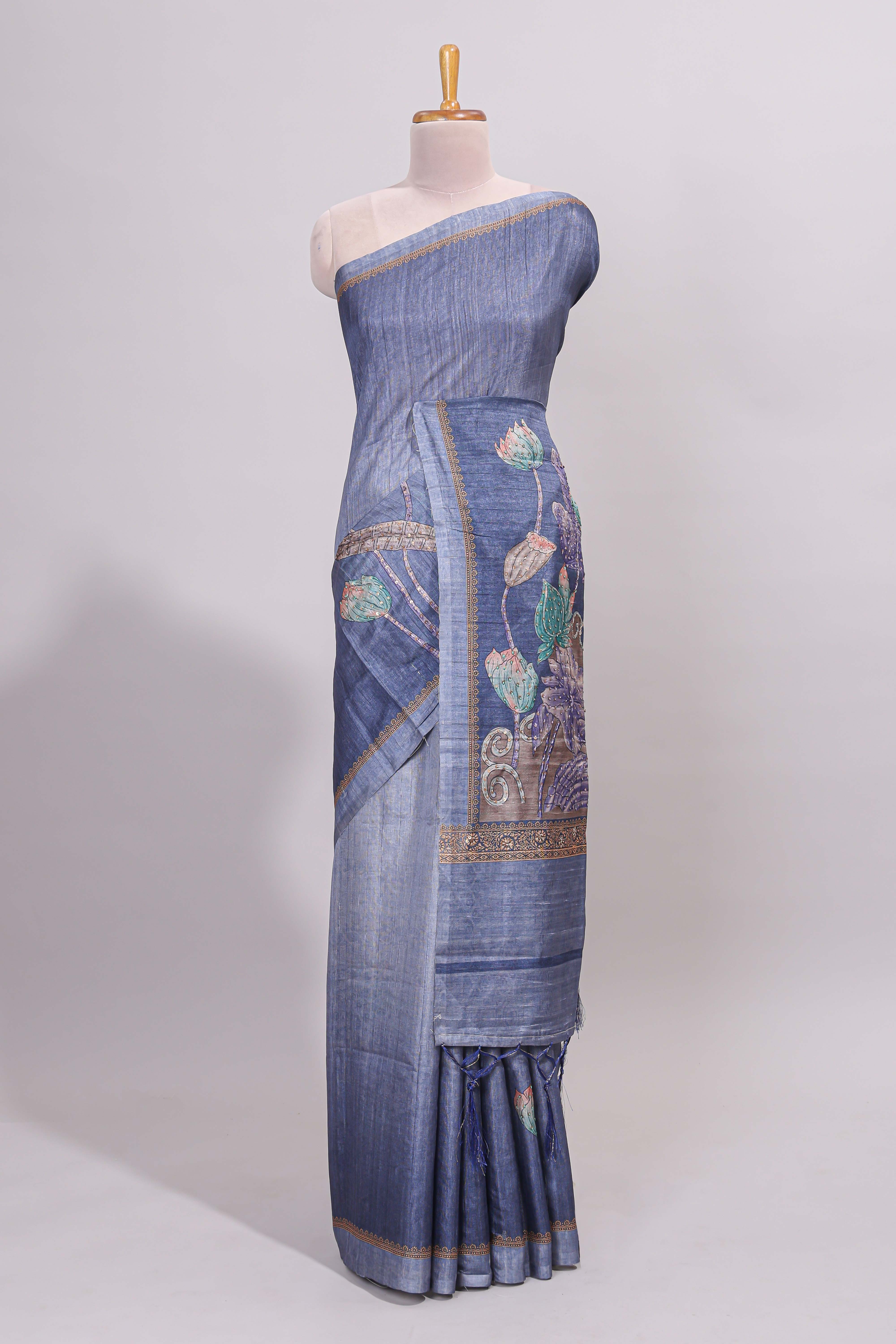 Blue floral design semi tussar saree with self border and matching printed blouse