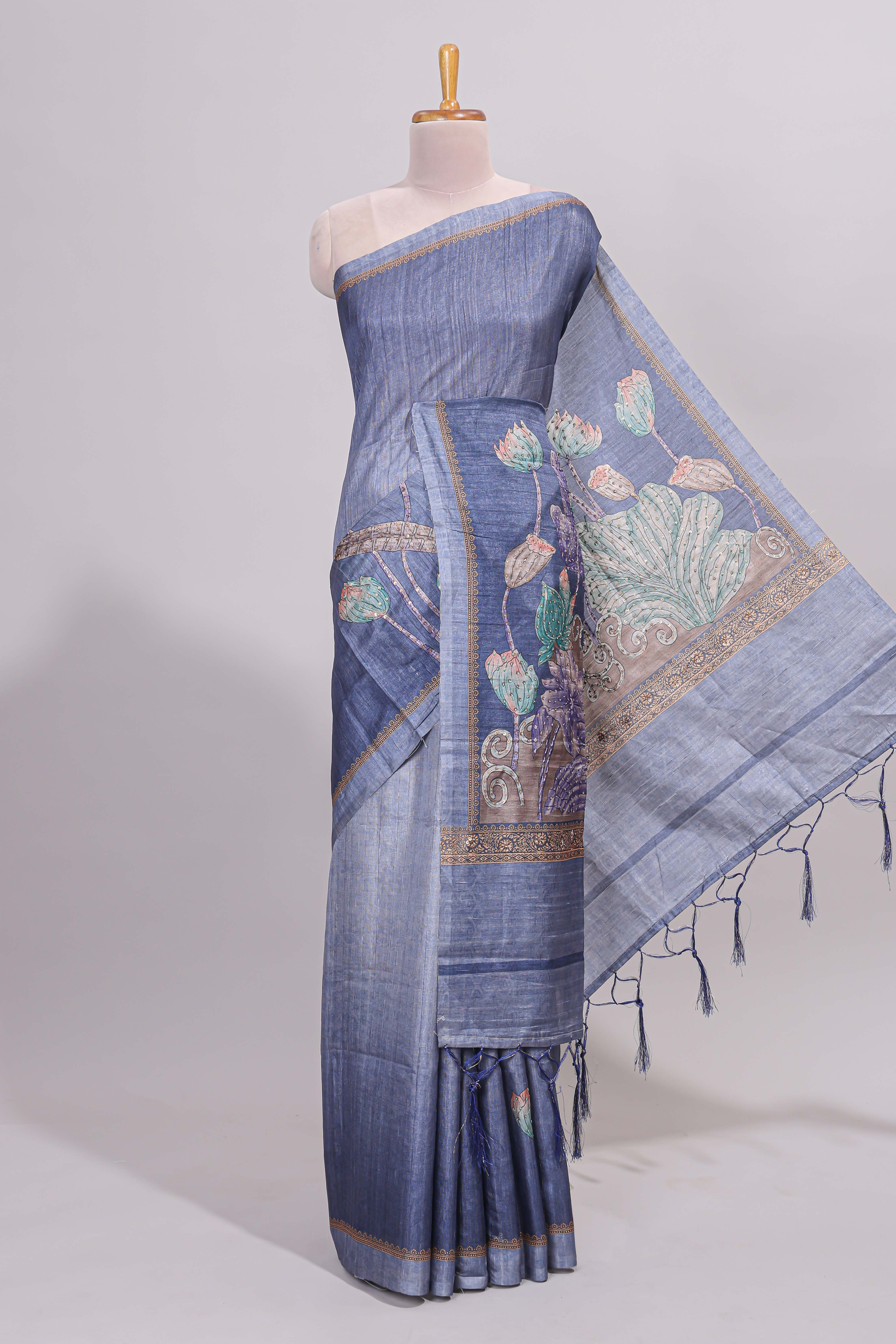 Blue floral design semi tussar saree with self border and matching printed blouse