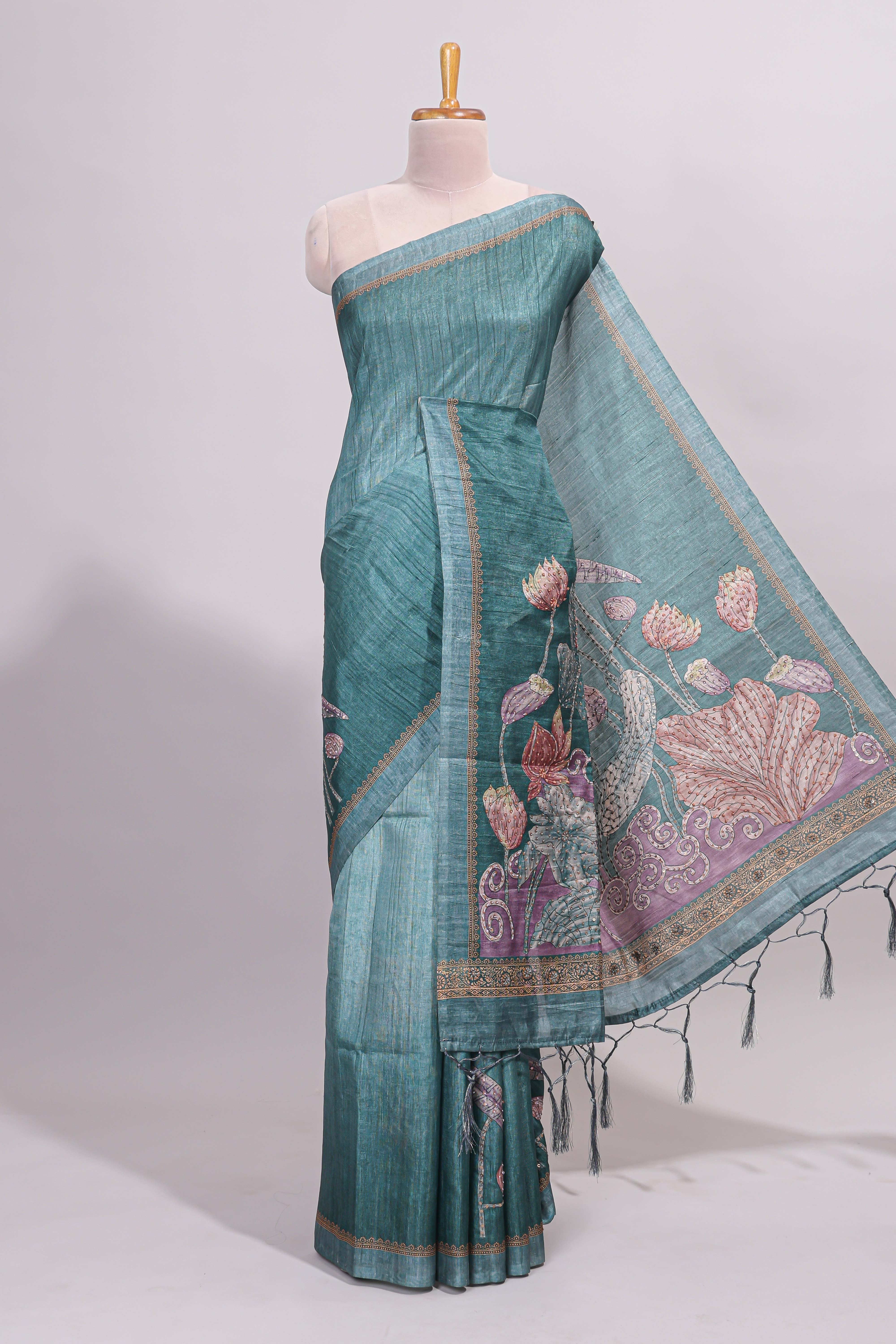 Green floral design semi tussar saree with self border and matching printed blouse