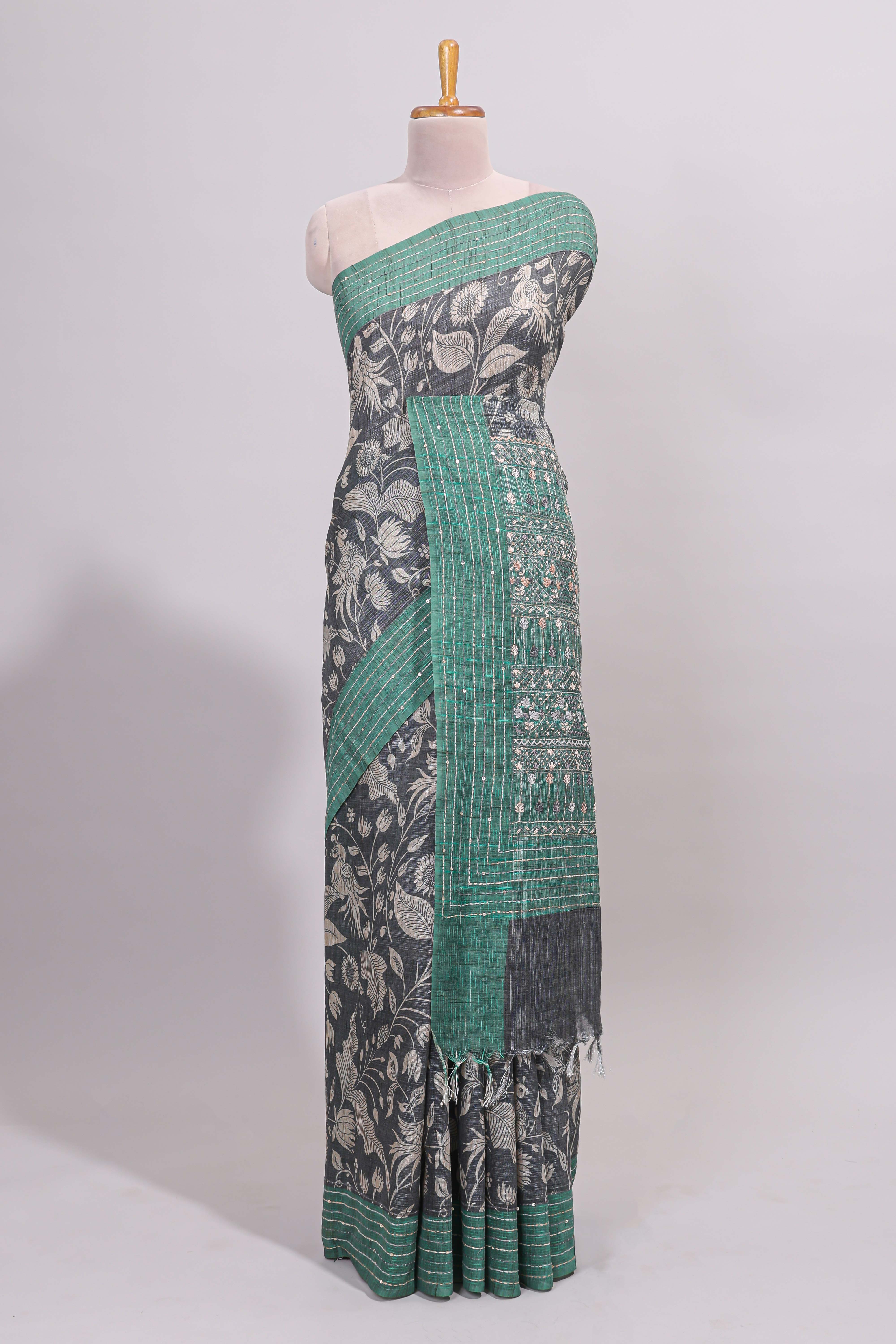 Grey floral design semi tussar saree with contrast green border and printed pallu