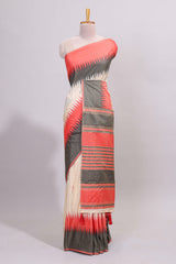 Off white ikkat design semi tussar saree with contrast dual shade border and matching striped blouse