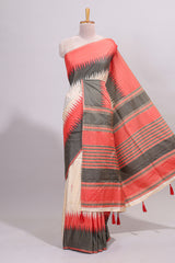 Off white ikkat design semi tussar saree with contrast dual shade border and matching striped blouse