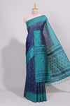 Blue ikkat motifs design semi tussar saree with contrast border and striped blouse