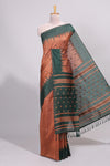 Rust orange ikkat motifs design semi tussar saree with contrast border and motifs blouse
