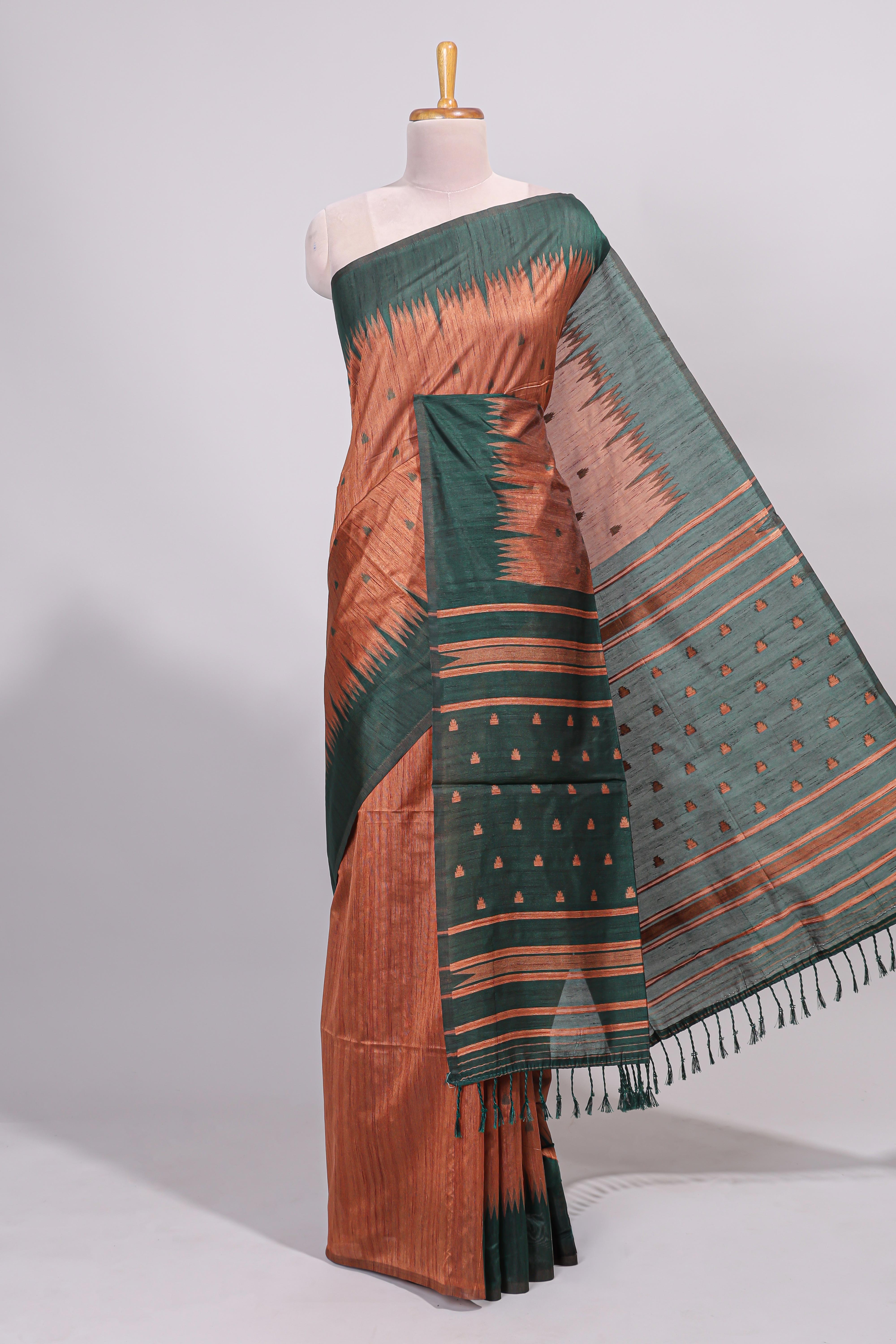Rust orange ikkat motifs design semi tussar saree with contrast border and motifs blouse