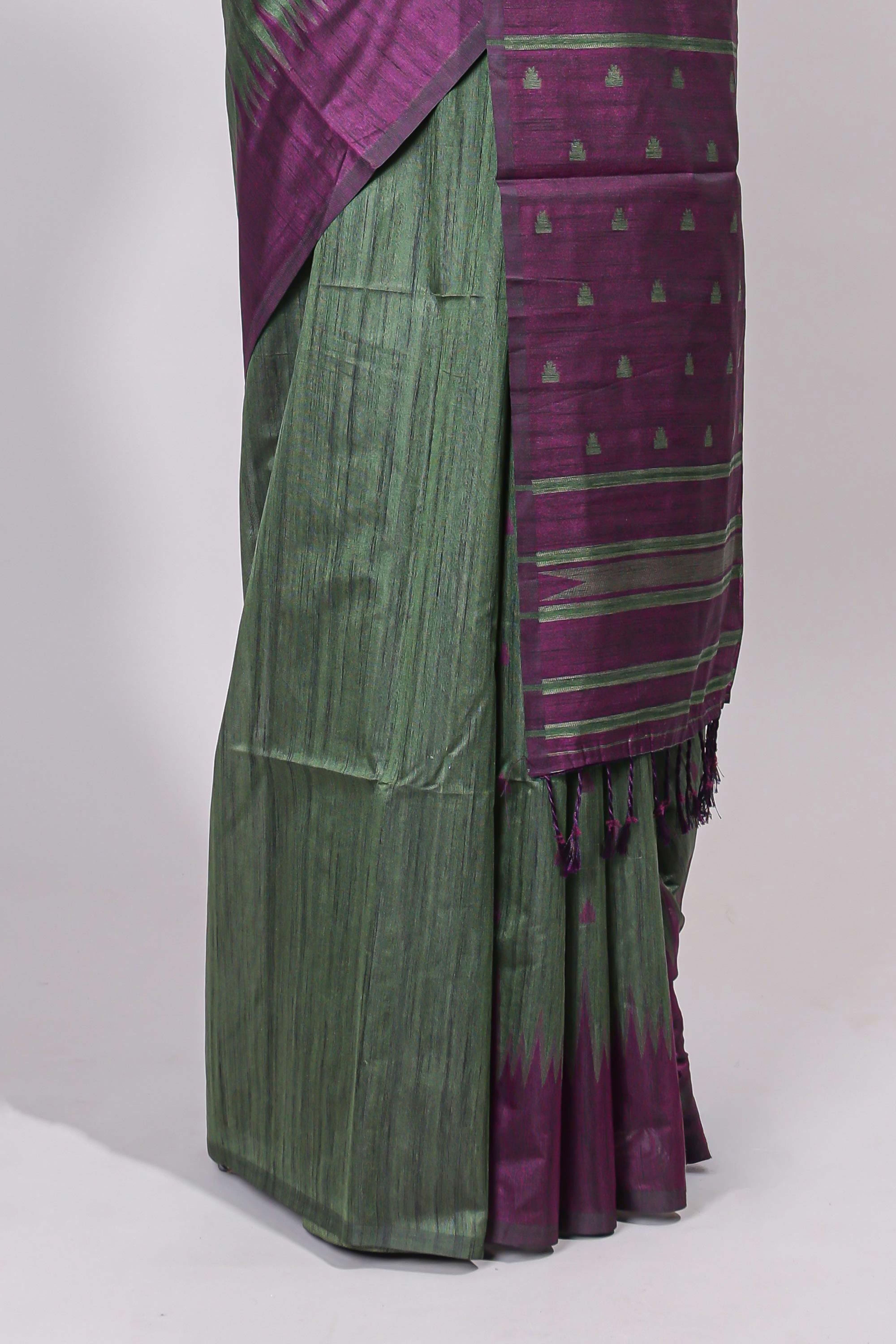 Bottel green ikkat motifs design semi tussar saree with contrast border and motifs blouse
