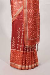 Rust maroon tussar saree all over body ikkat print with contrast small zari border , bandhani print pallu and ikkat contrast blouse