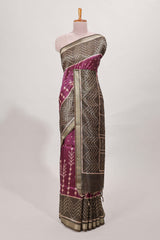 Violet tussar saree body ikkat print with contrast small zari border , bandhani print pallu and ikkat contrast blouse