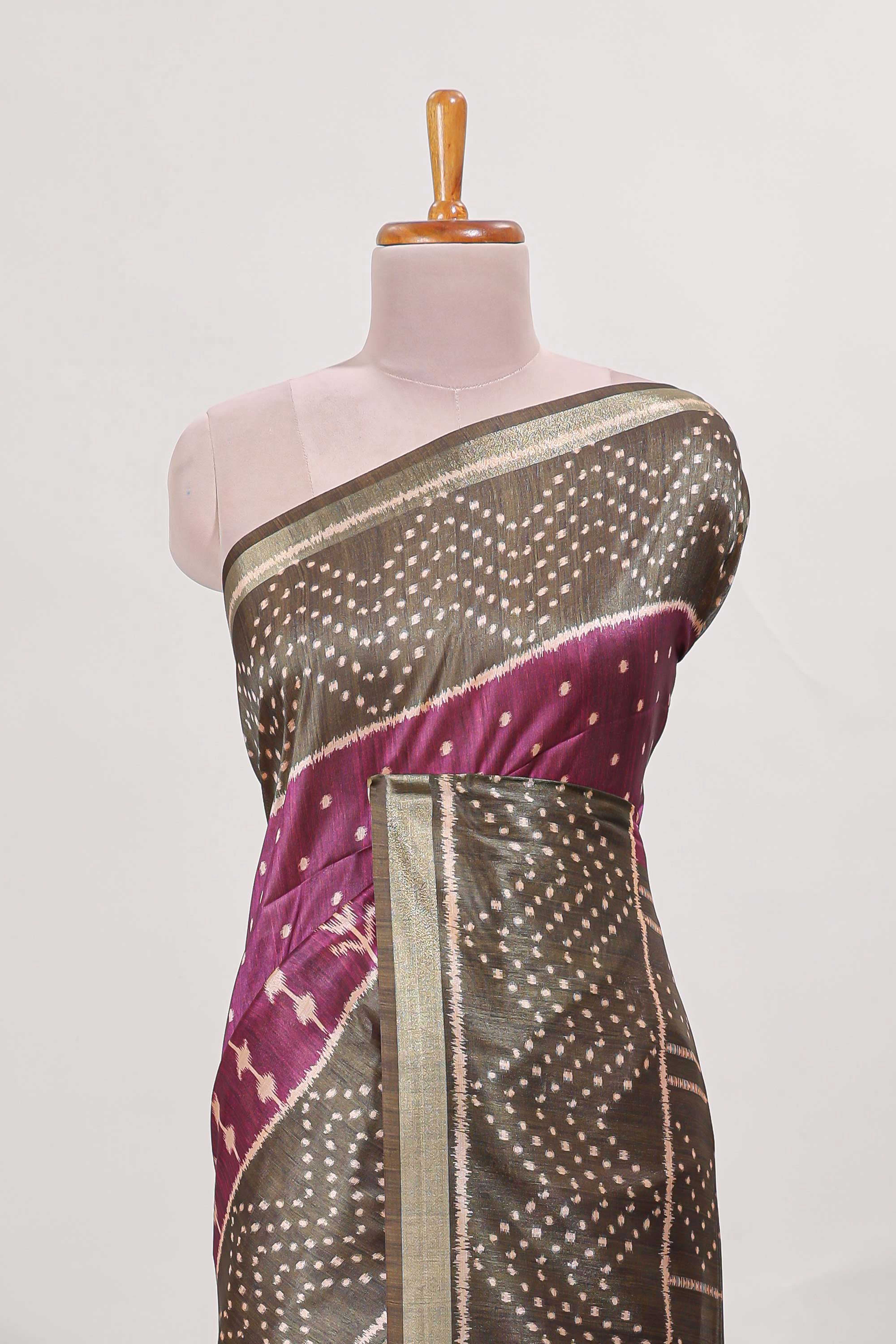 Violet tussar saree body ikkat print with contrast small zari border , bandhani print pallu and ikkat contrast blouse