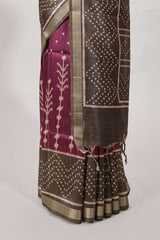 Violet tussar saree body ikkat print with contrast small zari border , bandhani print pallu and ikkat contrast blouse