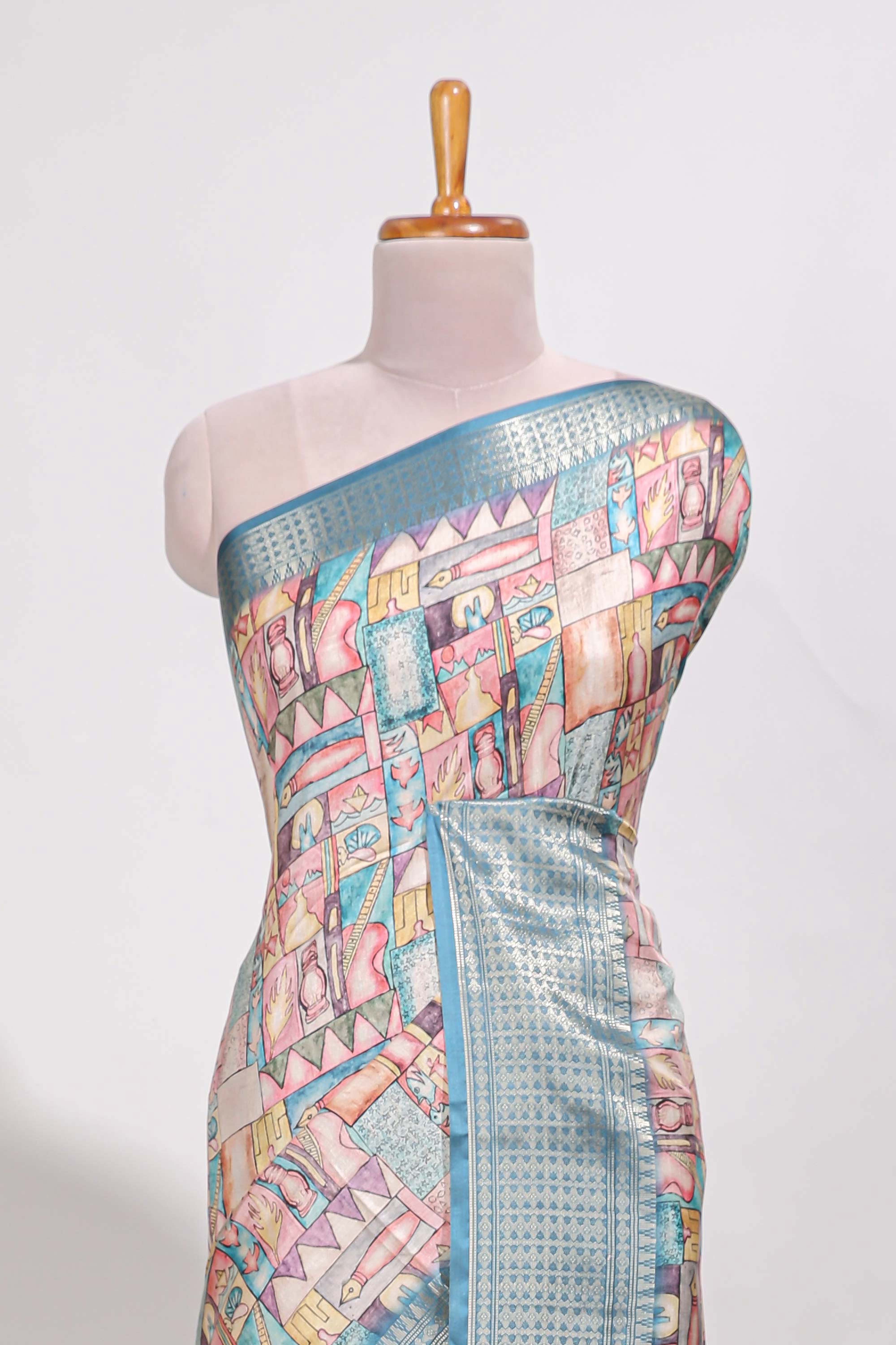Blue colour story bookprintedsemi tussar saree with zari border and zari weaving blouse