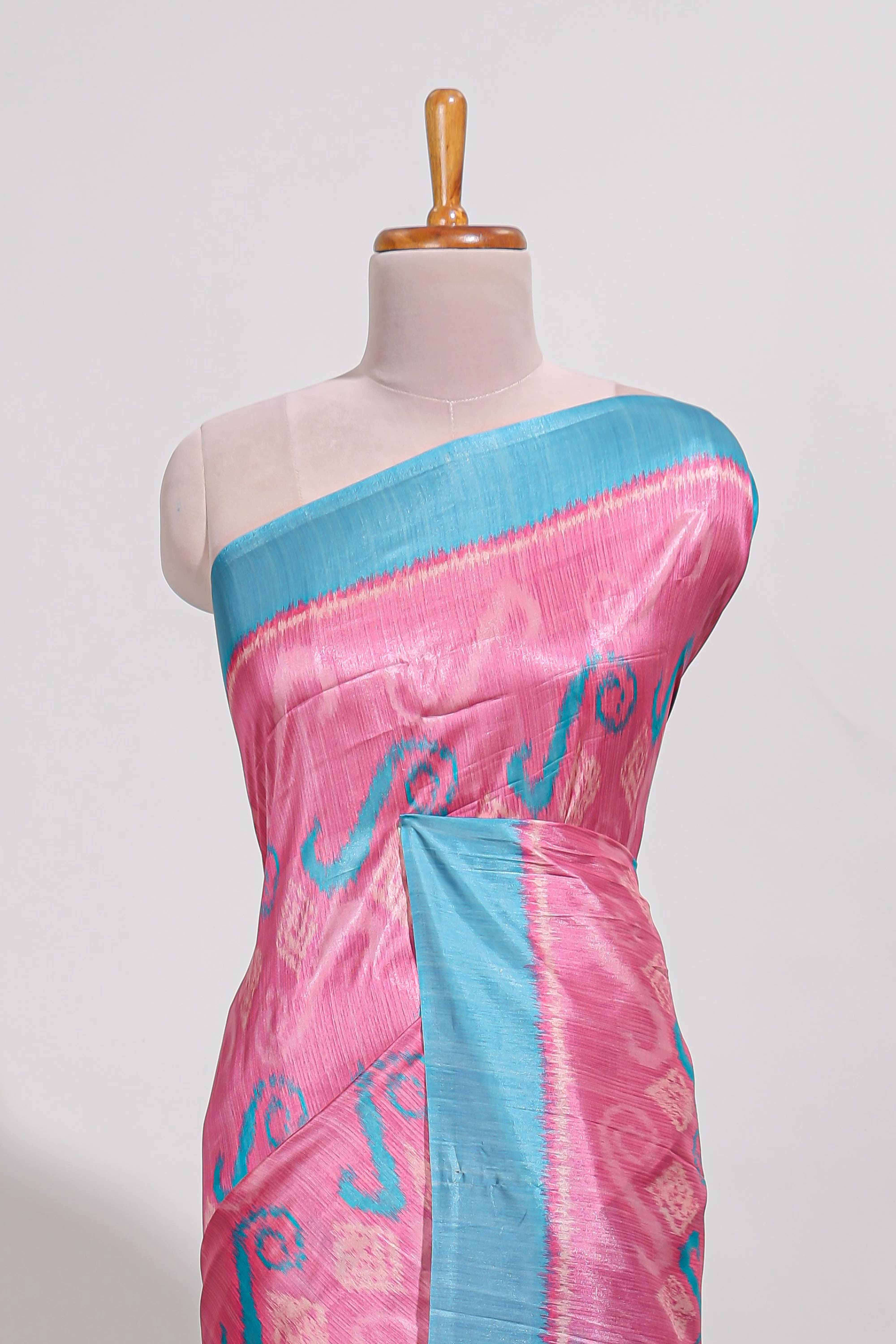 Pink colour and ikkat printed designsemi tussar saree with contrast border andcontrast blouse