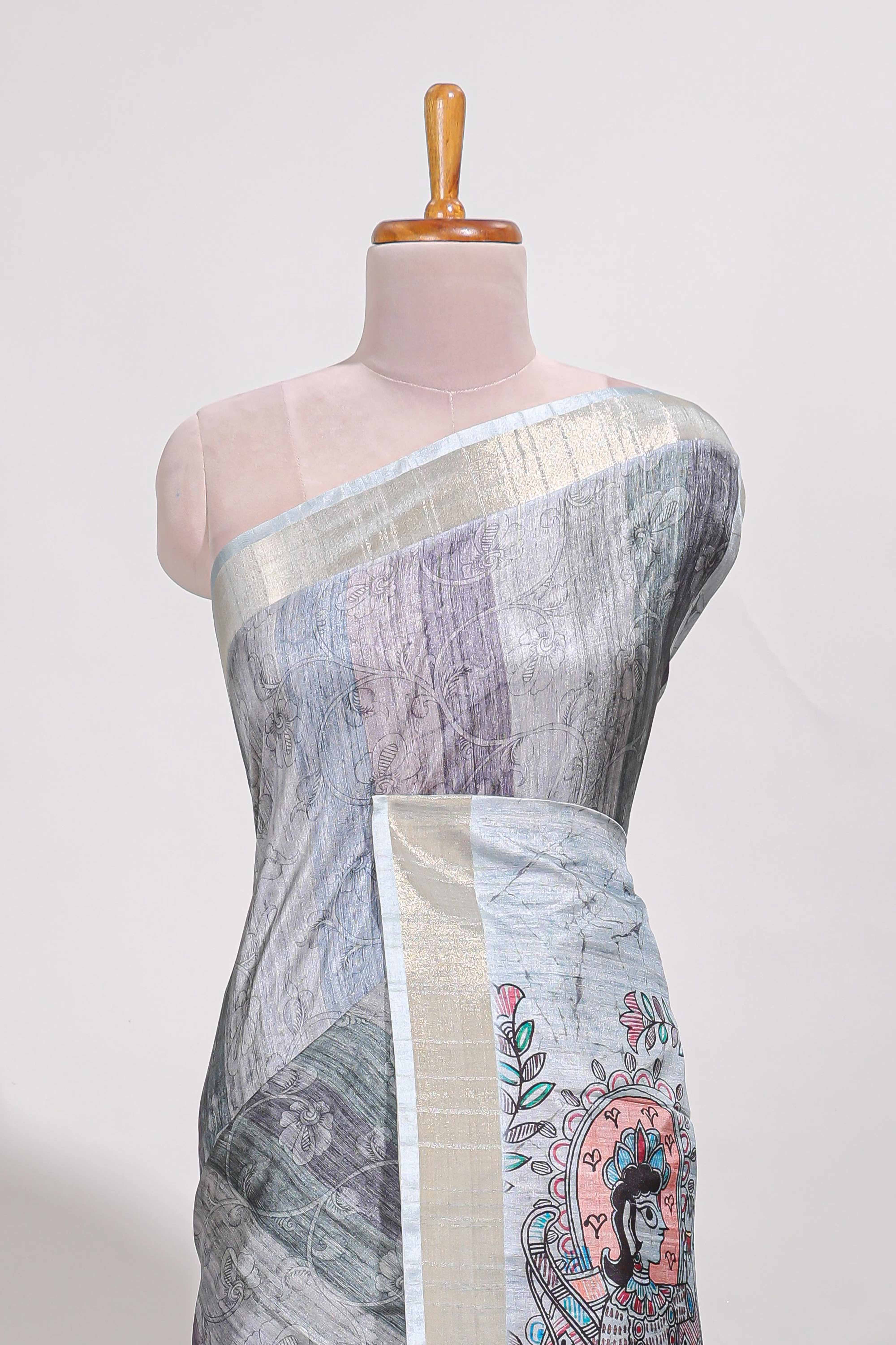 Green colour kalamakri arttussar sareewith floral creeper prints zari border and kalamkari peacock motif print pallu