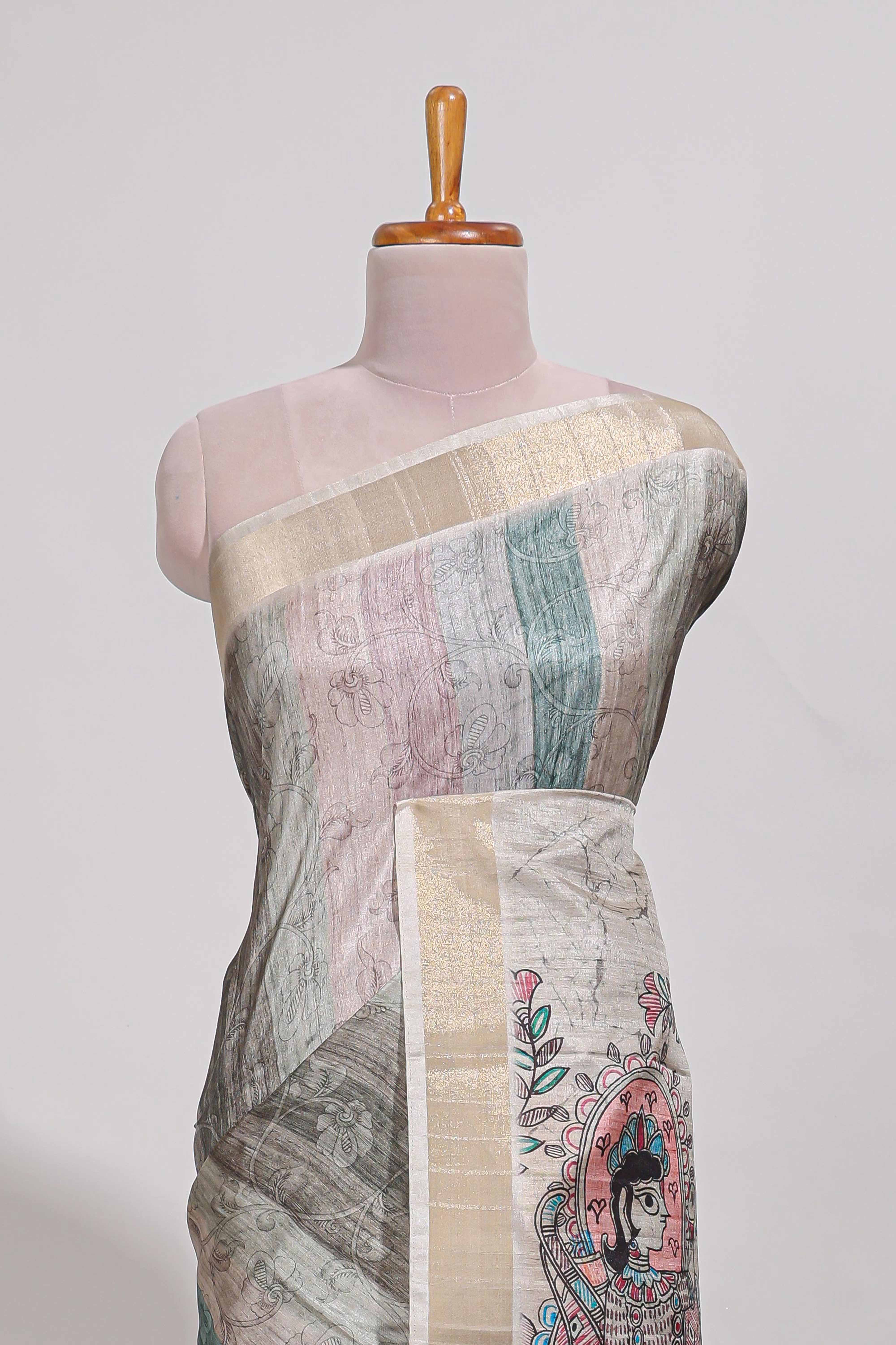 Green colour kalamakri arttussar sareewith floral creeper prints zari border and kalamkari motif print pallu