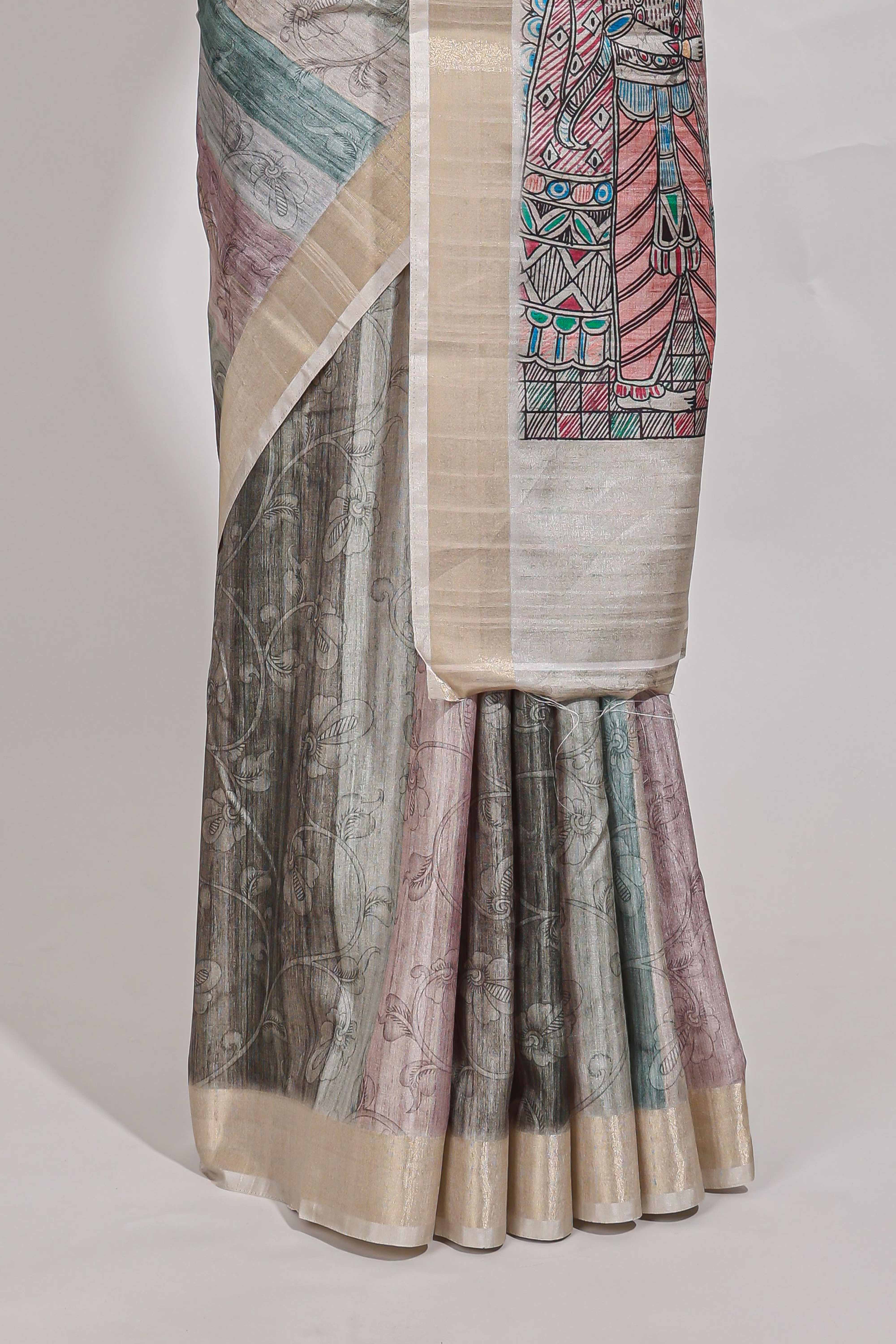 Green colour kalamakri arttussar sareewith floral creeper prints zari border and kalamkari motif print pallu