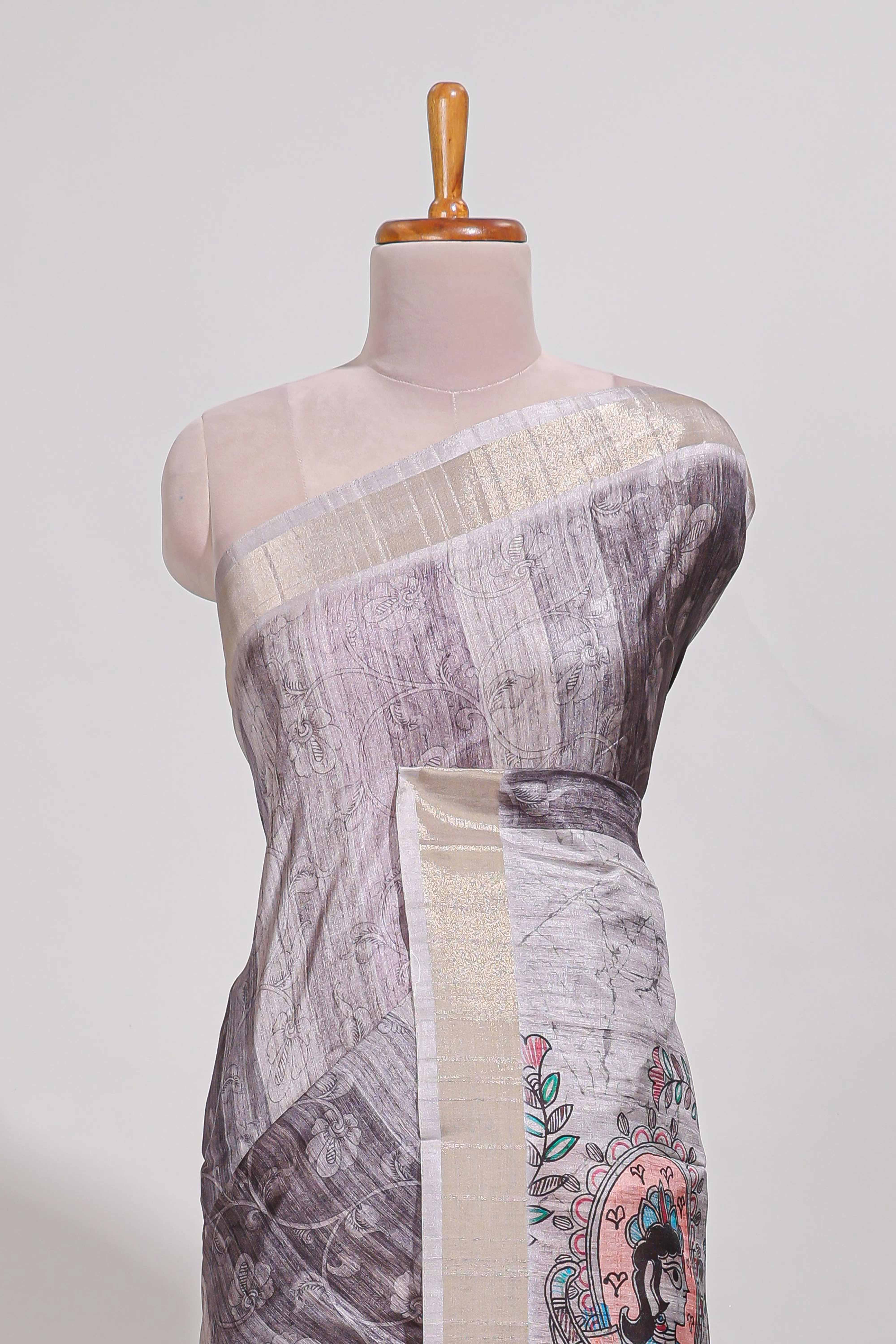 Multi colour kalamakri arttussar sareewith floral creeper prints zari border and kalamkari motif print pallu
