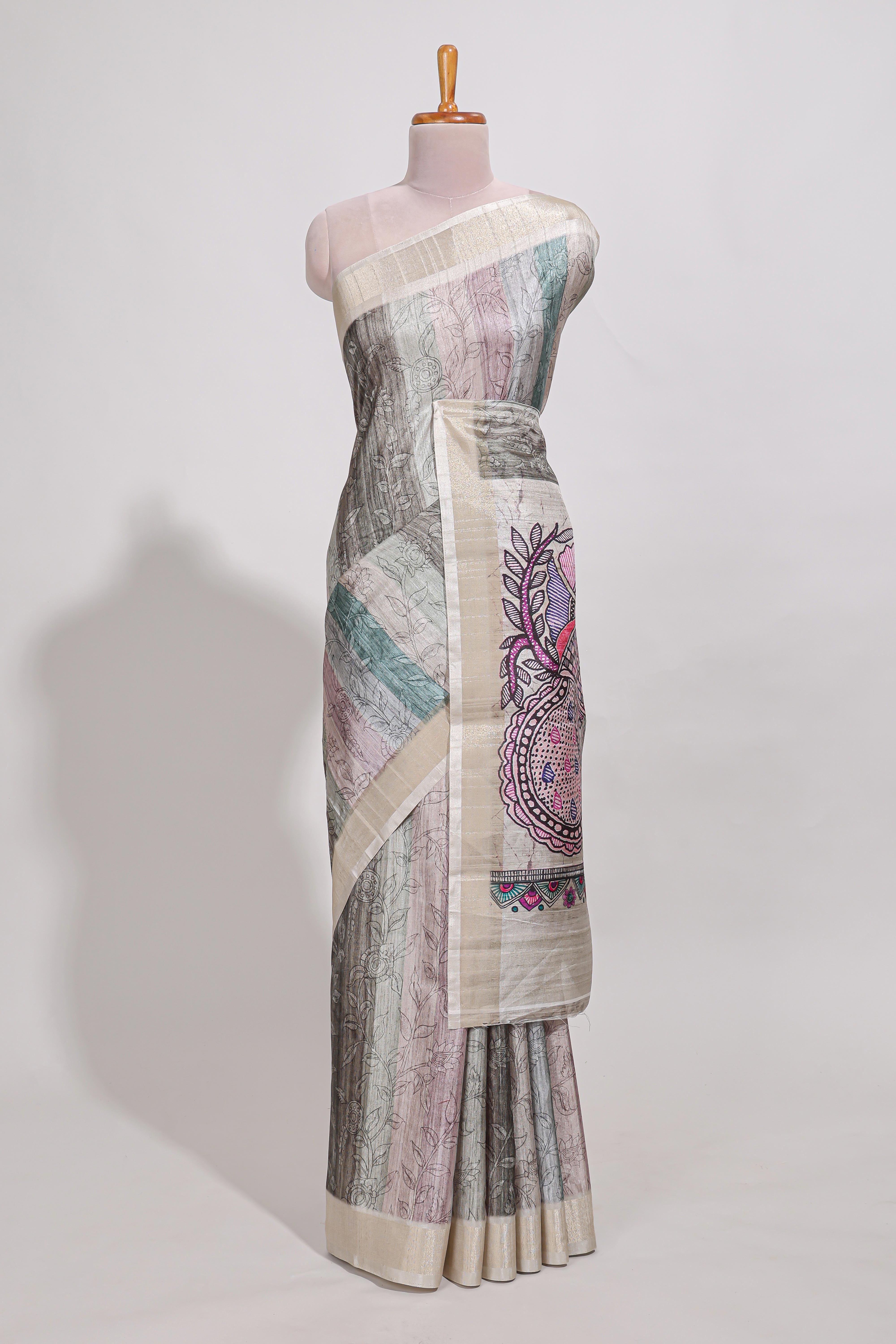 Pastel green colour kalamakri arttussar sareewith floral creeper prints zari border and kalamkari peacock motif print pallu