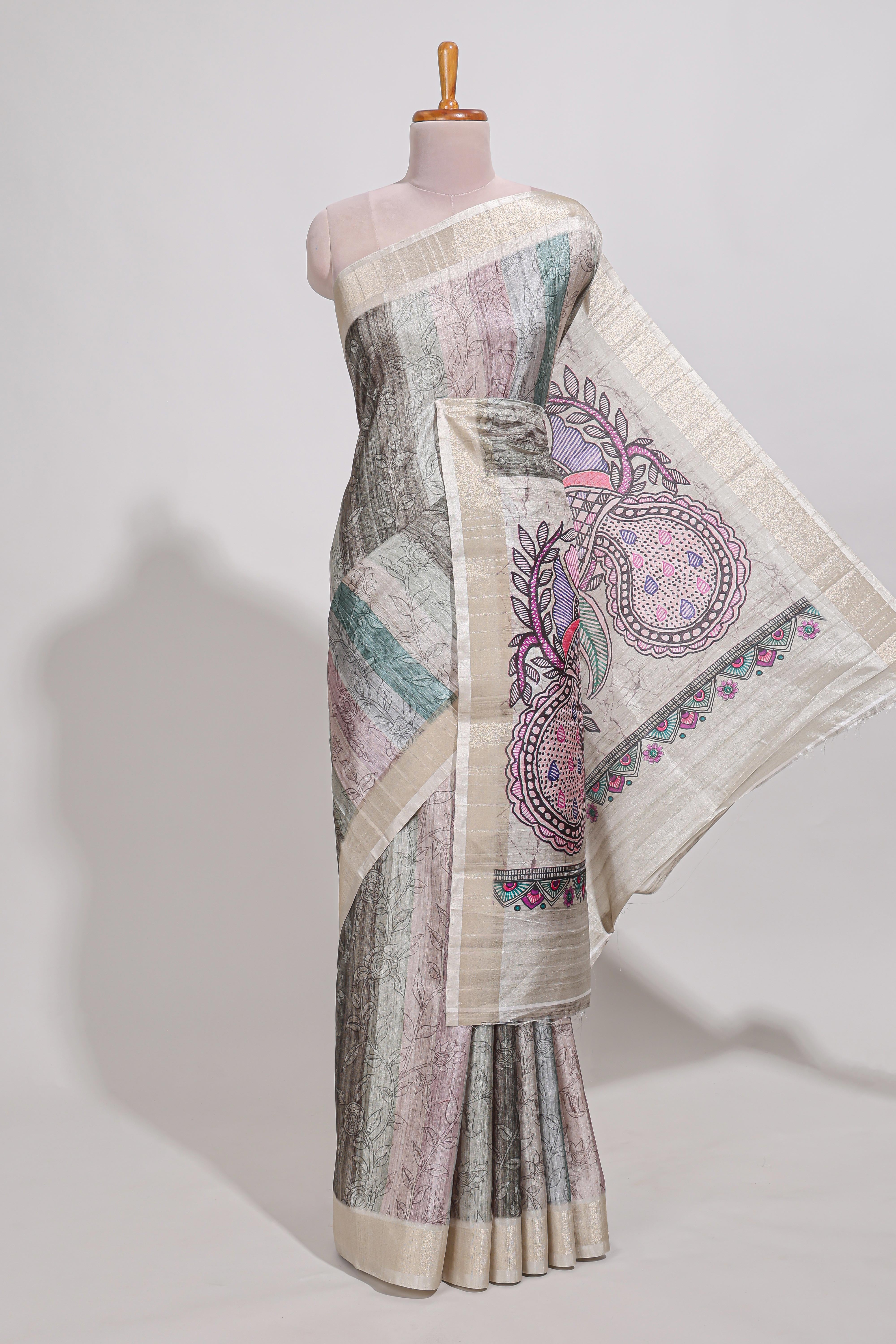 Pastel green colour kalamakri arttussar sareewith floral creeper prints zari border and kalamkari peacock motif print pallu