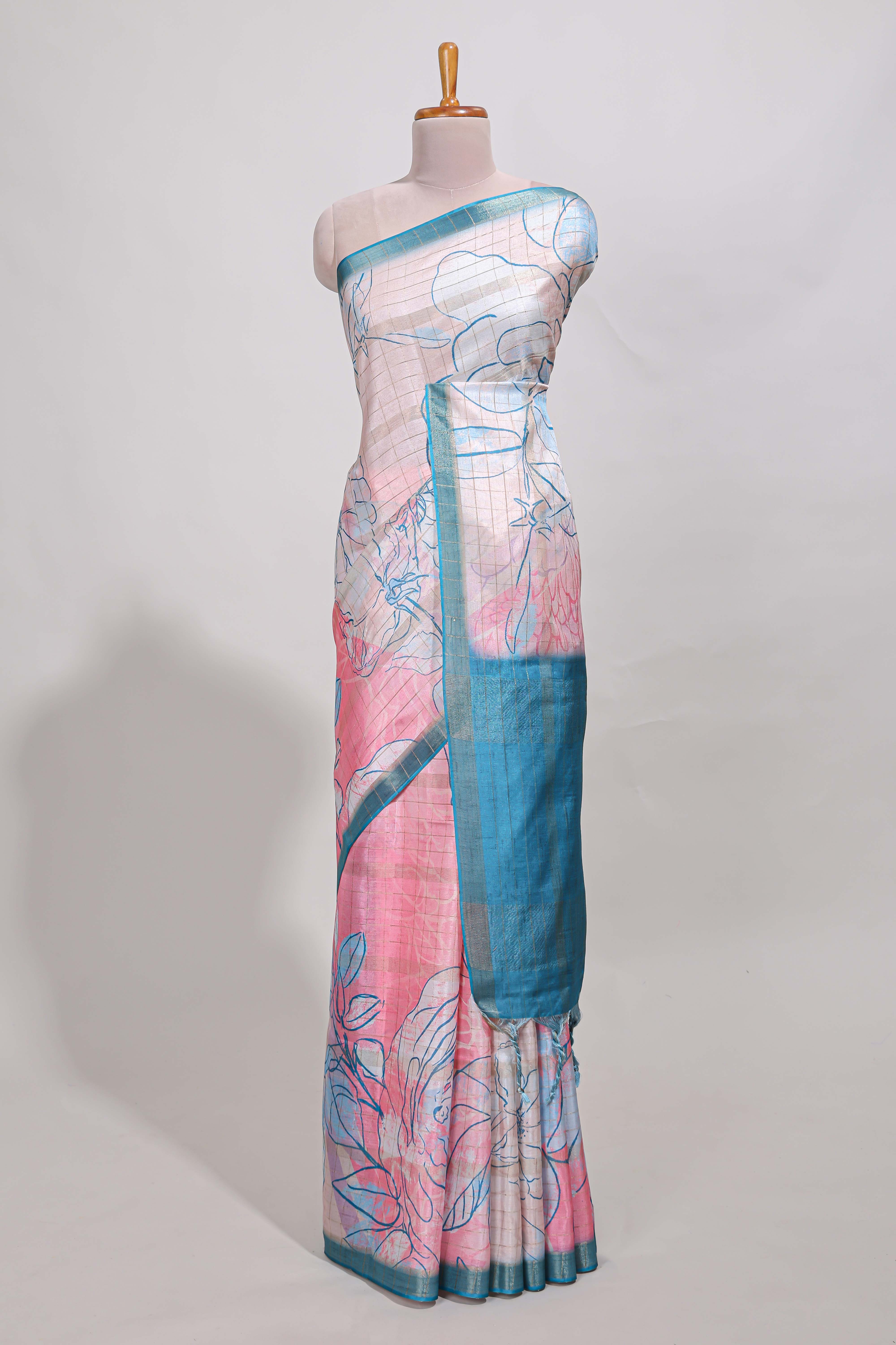 Multi colour and floral semi tussar saree with contrast border andcontrast blouse
