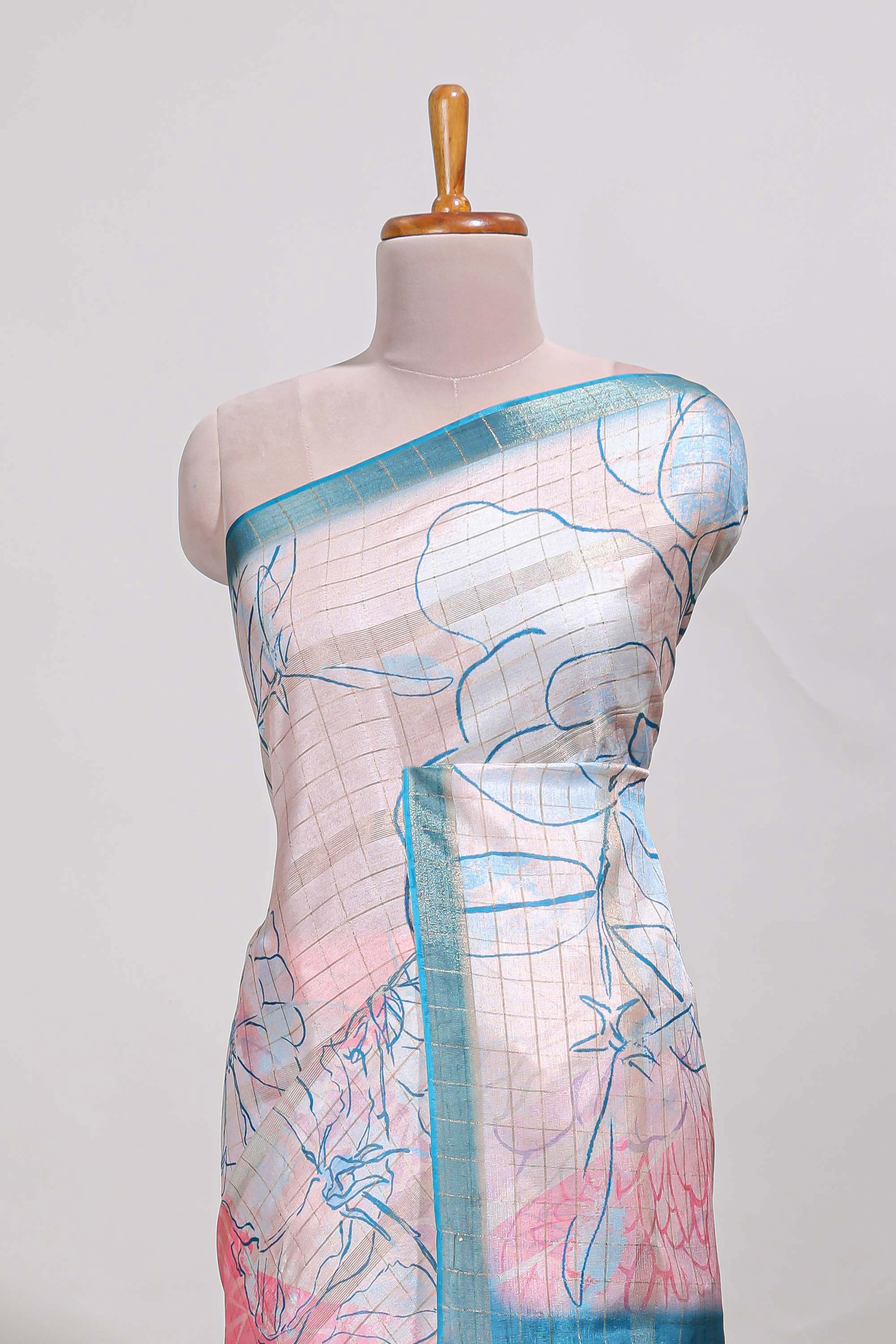 Multi colour and floral semi tussar saree with contrast border andcontrast blouse