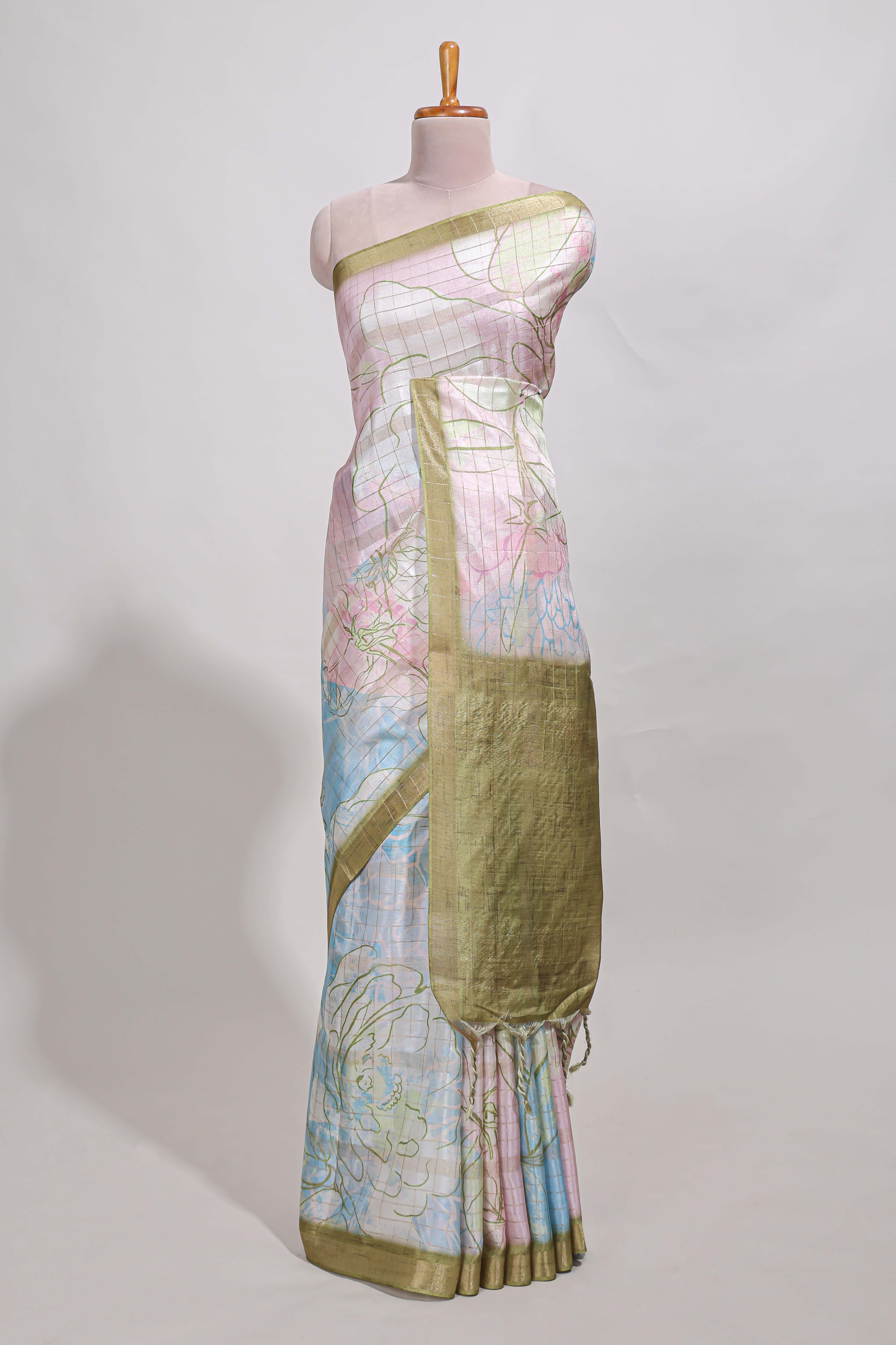 Multi colour and floral designsemi tussar saree with olive border andcontrast blouse