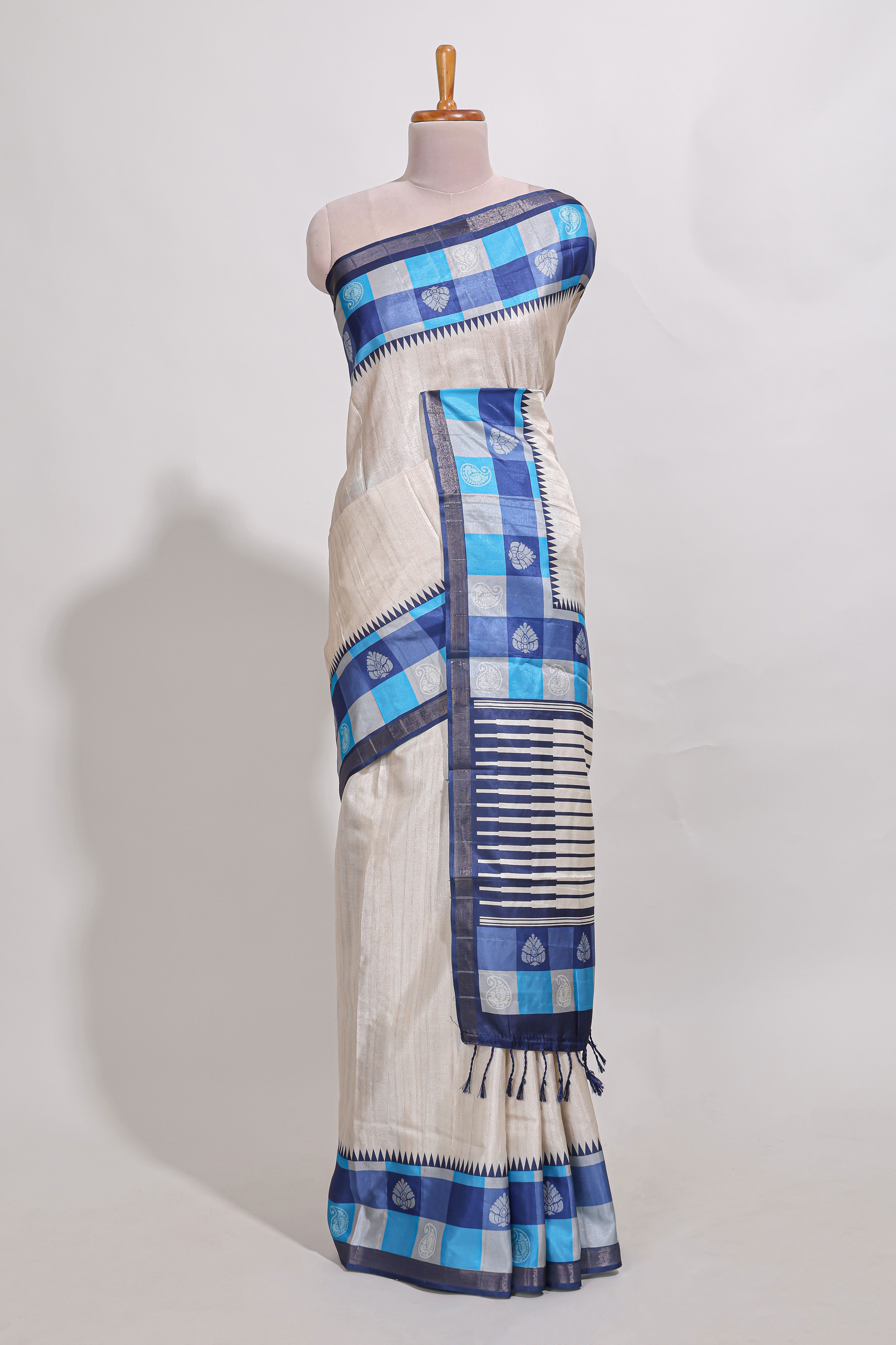 beige coloursemi tussar saree with contrast checkedborder andcontrastchecked blouse