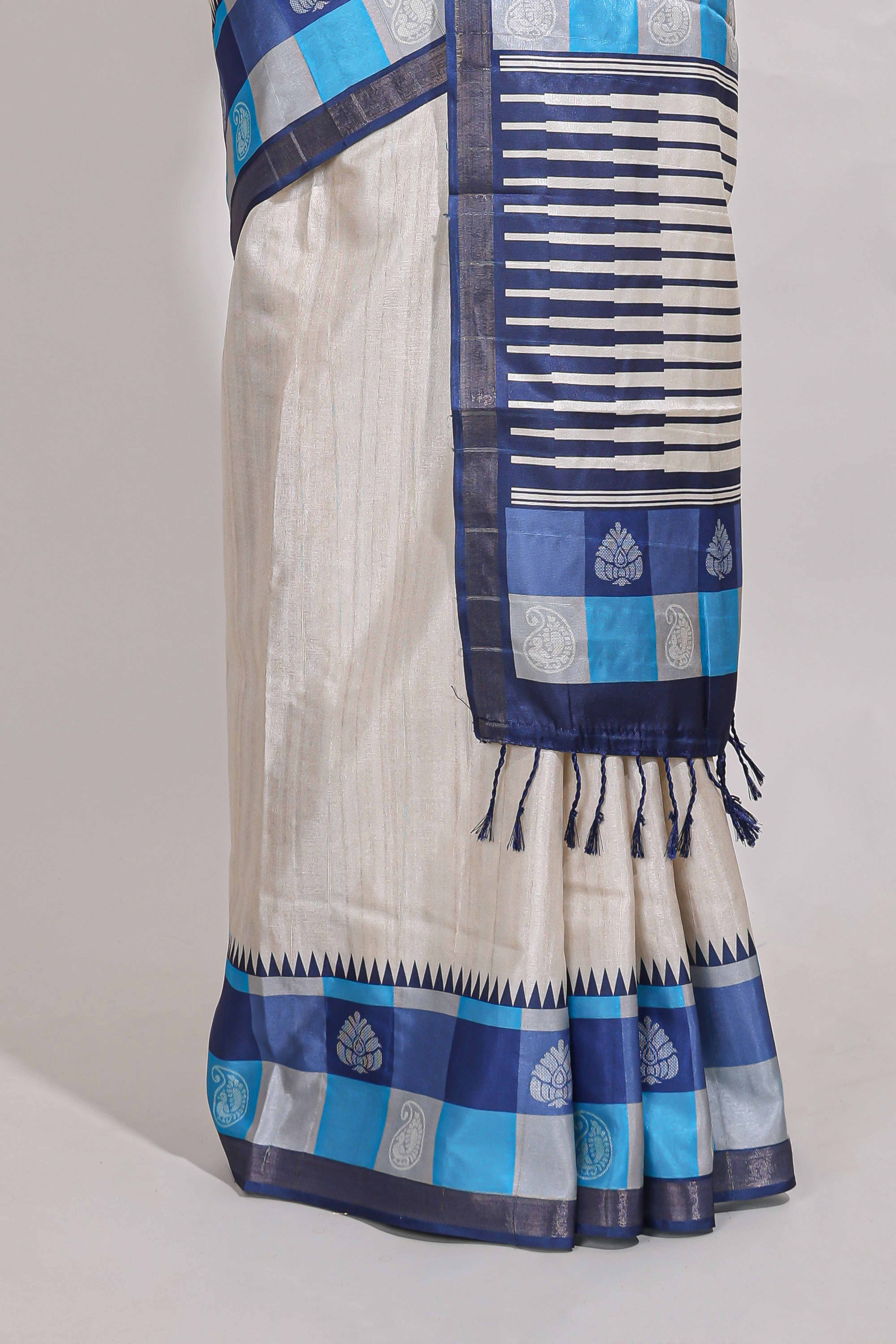 beige coloursemi tussar saree with contrast checkedborder andcontrastchecked blouse