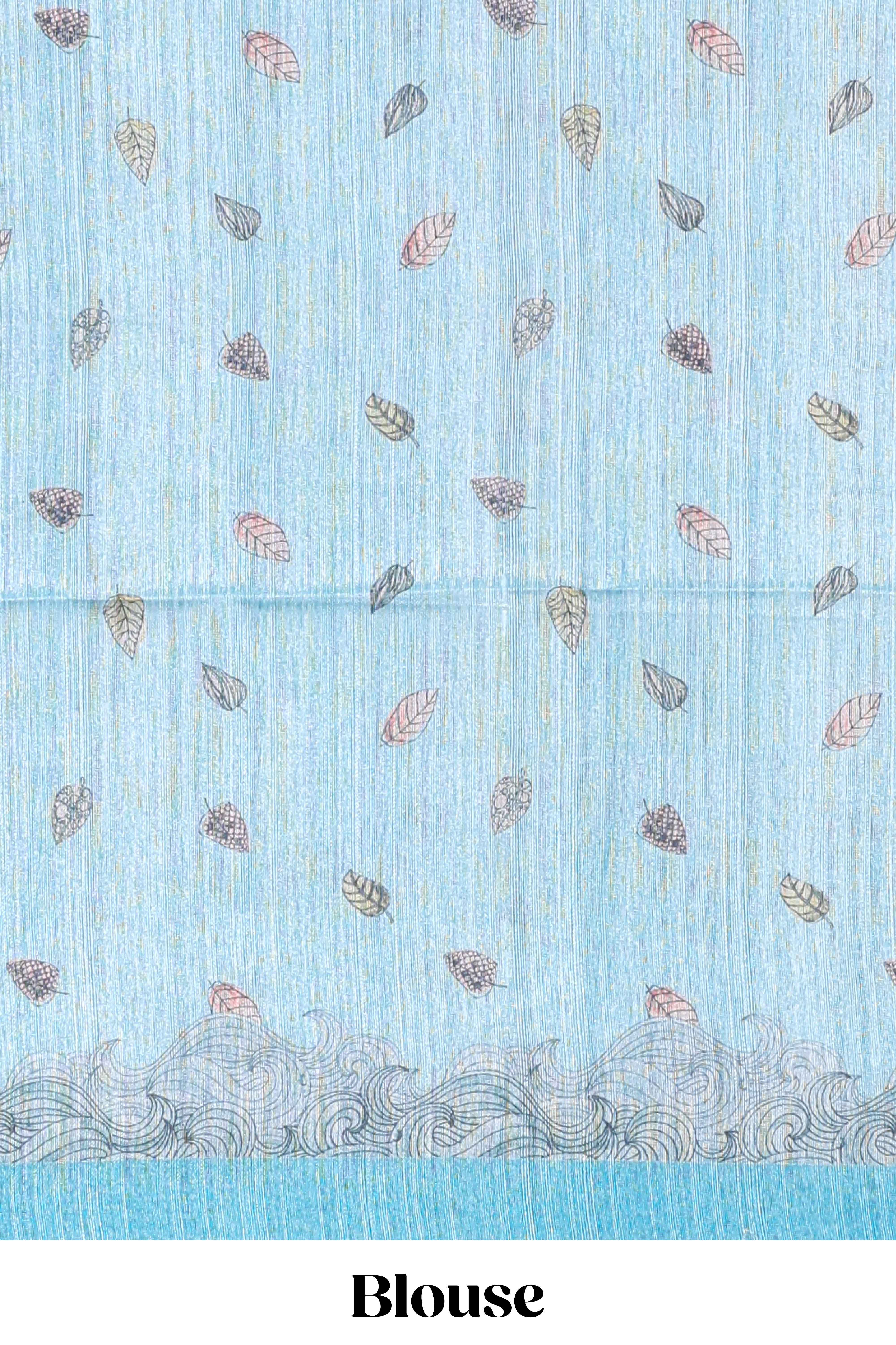 Blue colourprintedsemi tussar saree with pippingborder and leaf printed matching blouse