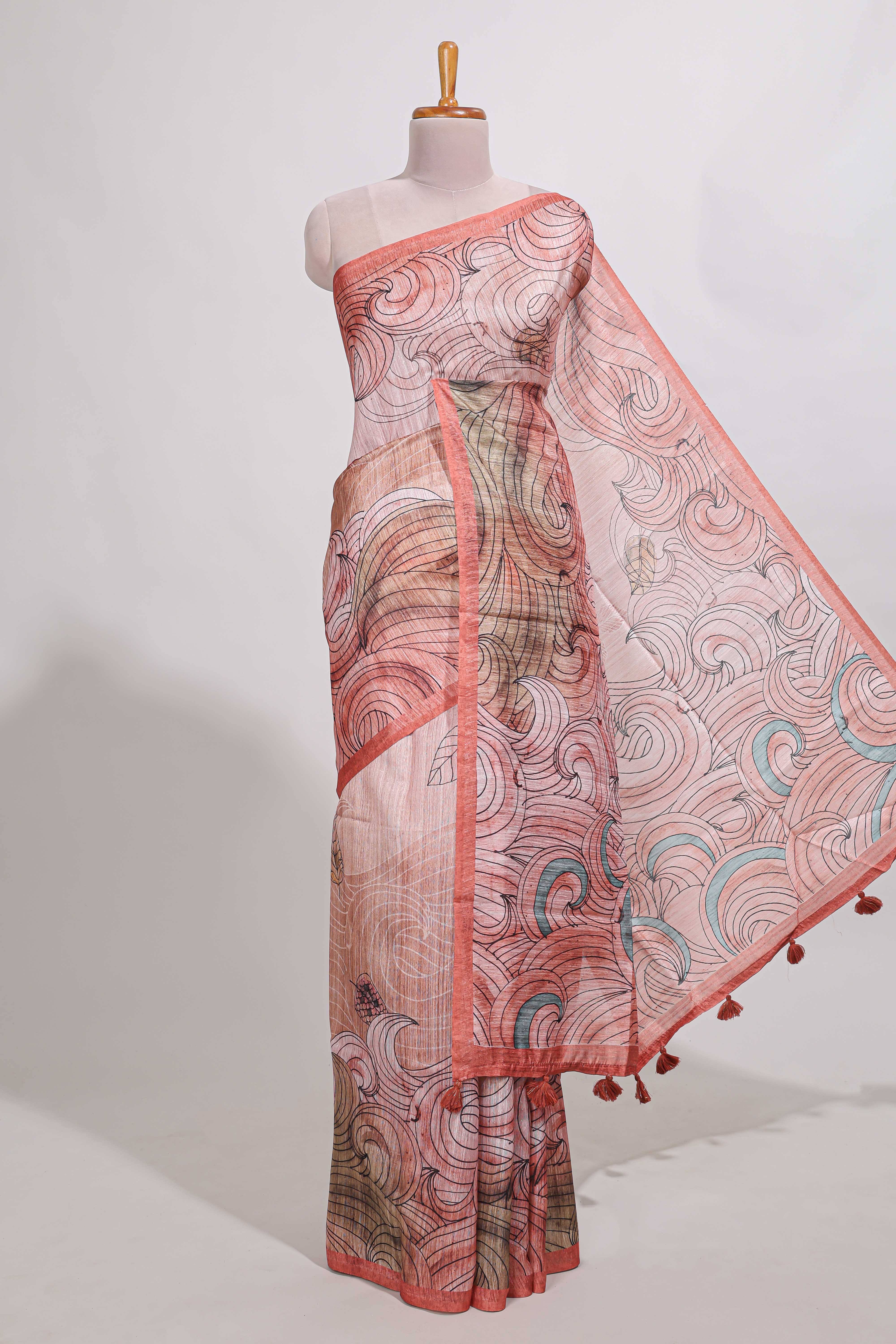 pink colourprintedsemi tussar saree with pippingborder and leaf printed matching blouse