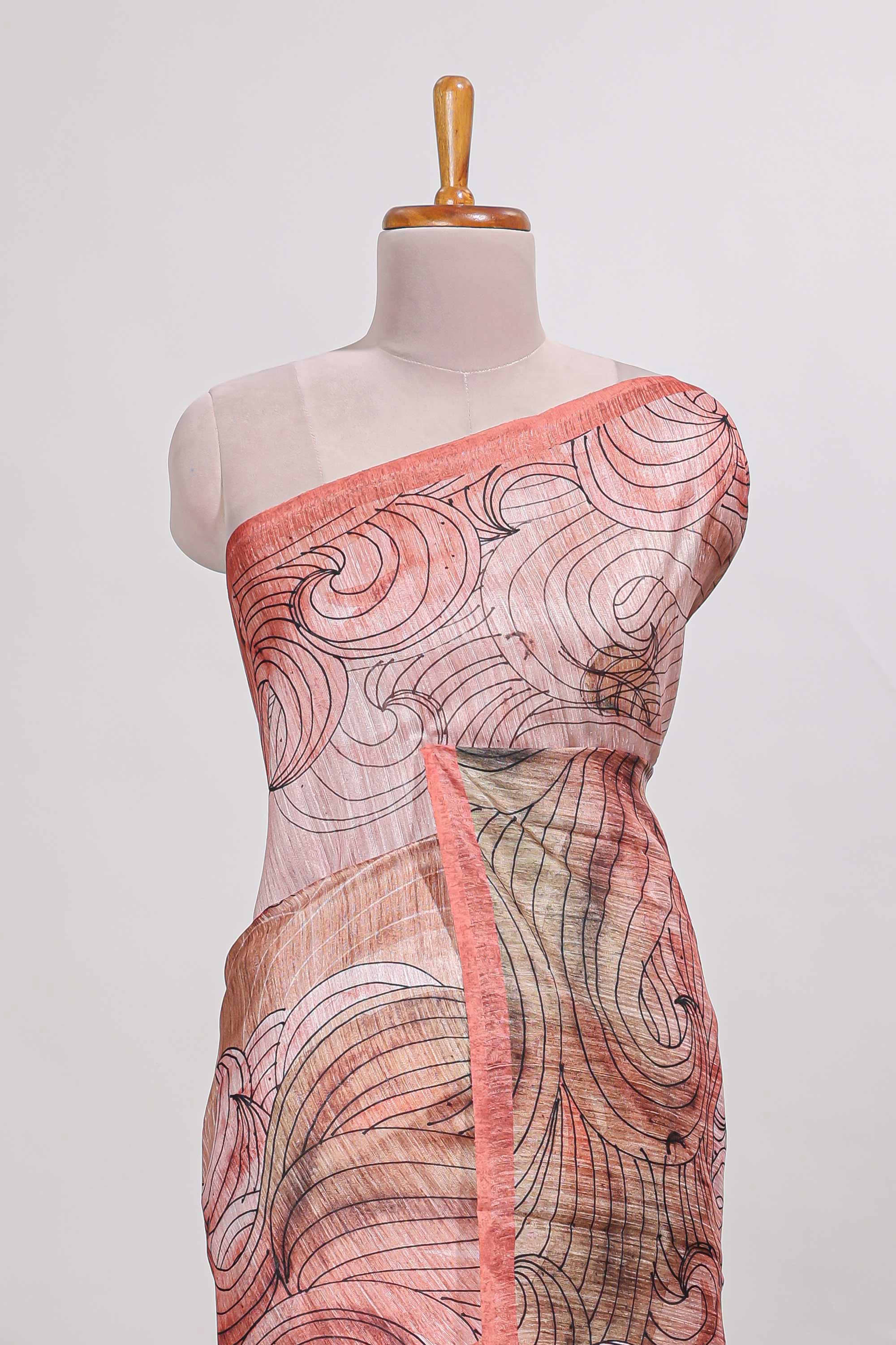 pink colourprintedsemi tussar saree with pippingborder and leaf printed matching blouse