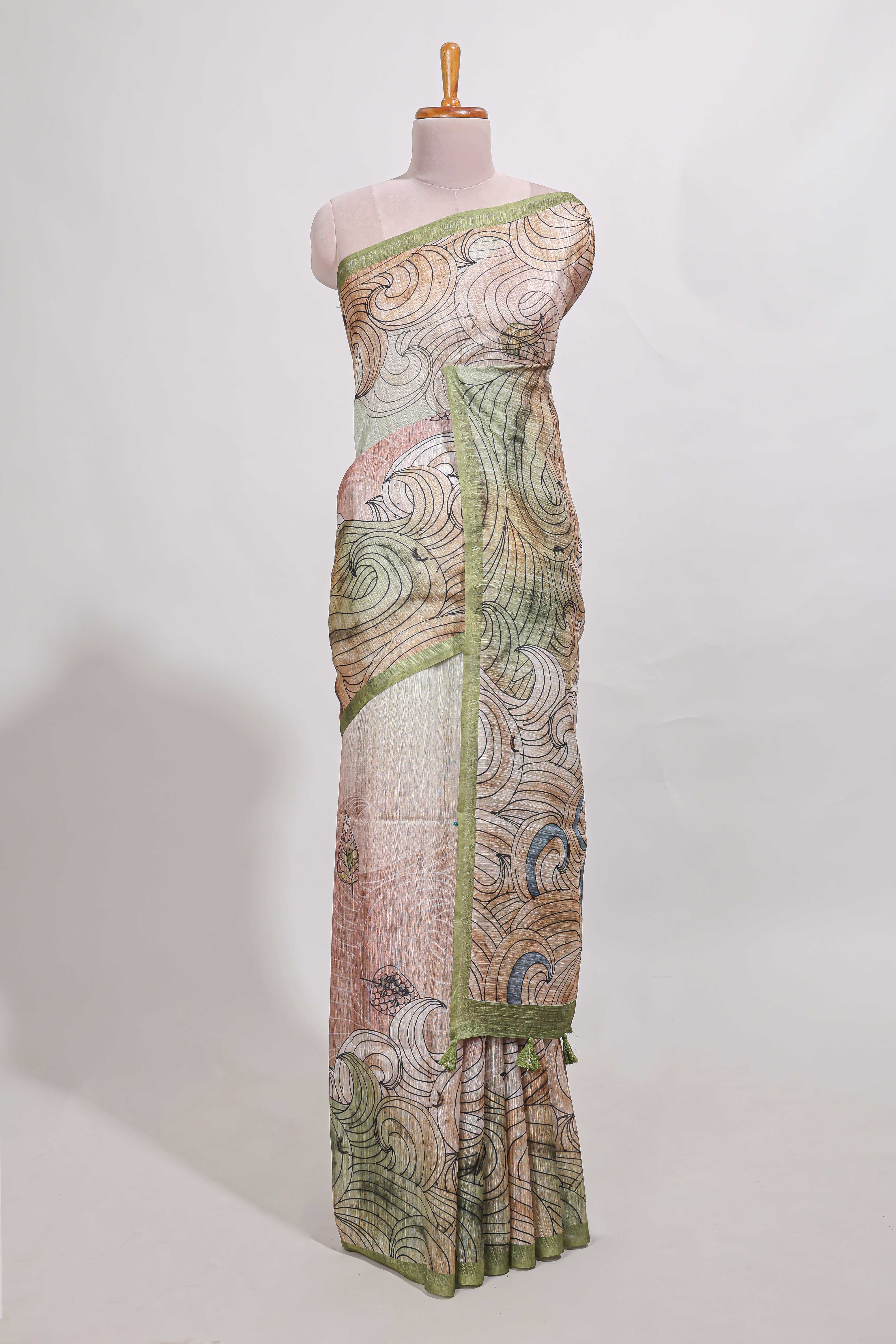 Light green colourprintedsemi tussar saree with pippingborder and leaf printed matching blouse