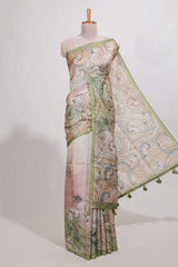 Light green colourprintedsemi tussar saree with pippingborder and leaf printed matching blouse