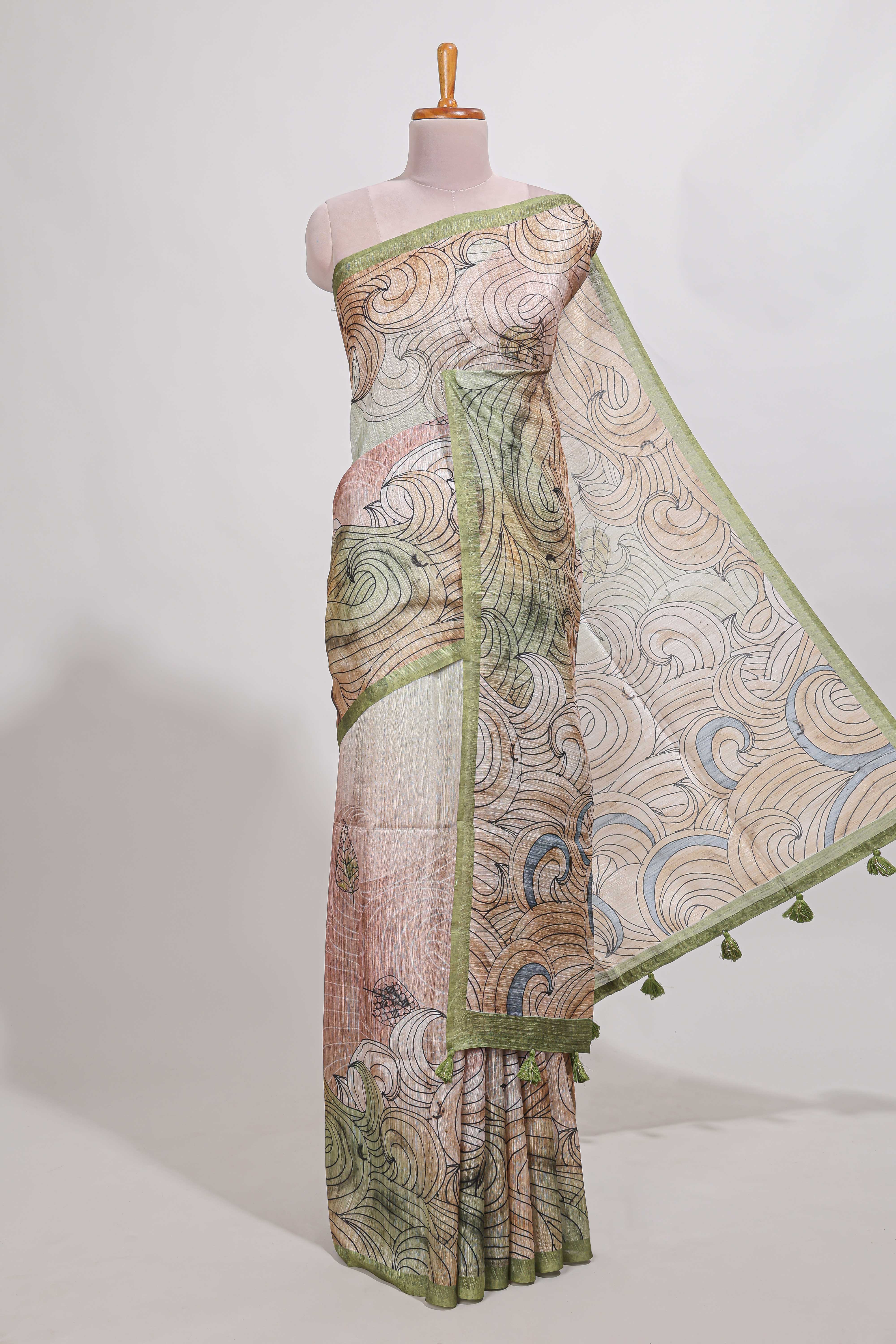Light green colourprintedsemi tussar saree with pippingborder and leaf printed matching blouse