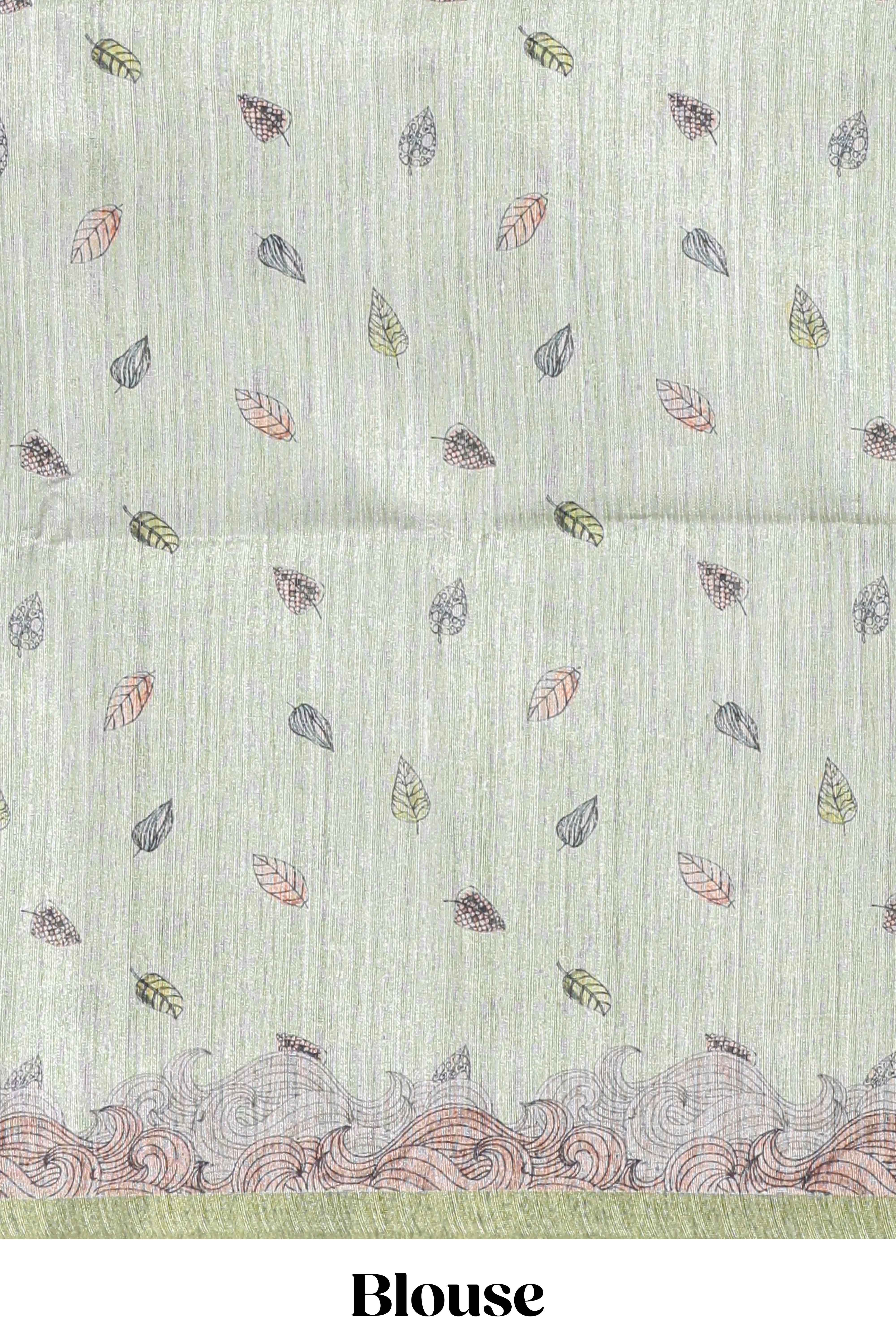 Light green colourprintedsemi tussar saree with pippingborder and leaf printed matching blouse