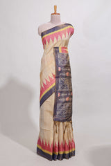 Beige colour semi tussar saree with temple border and tissue blouse