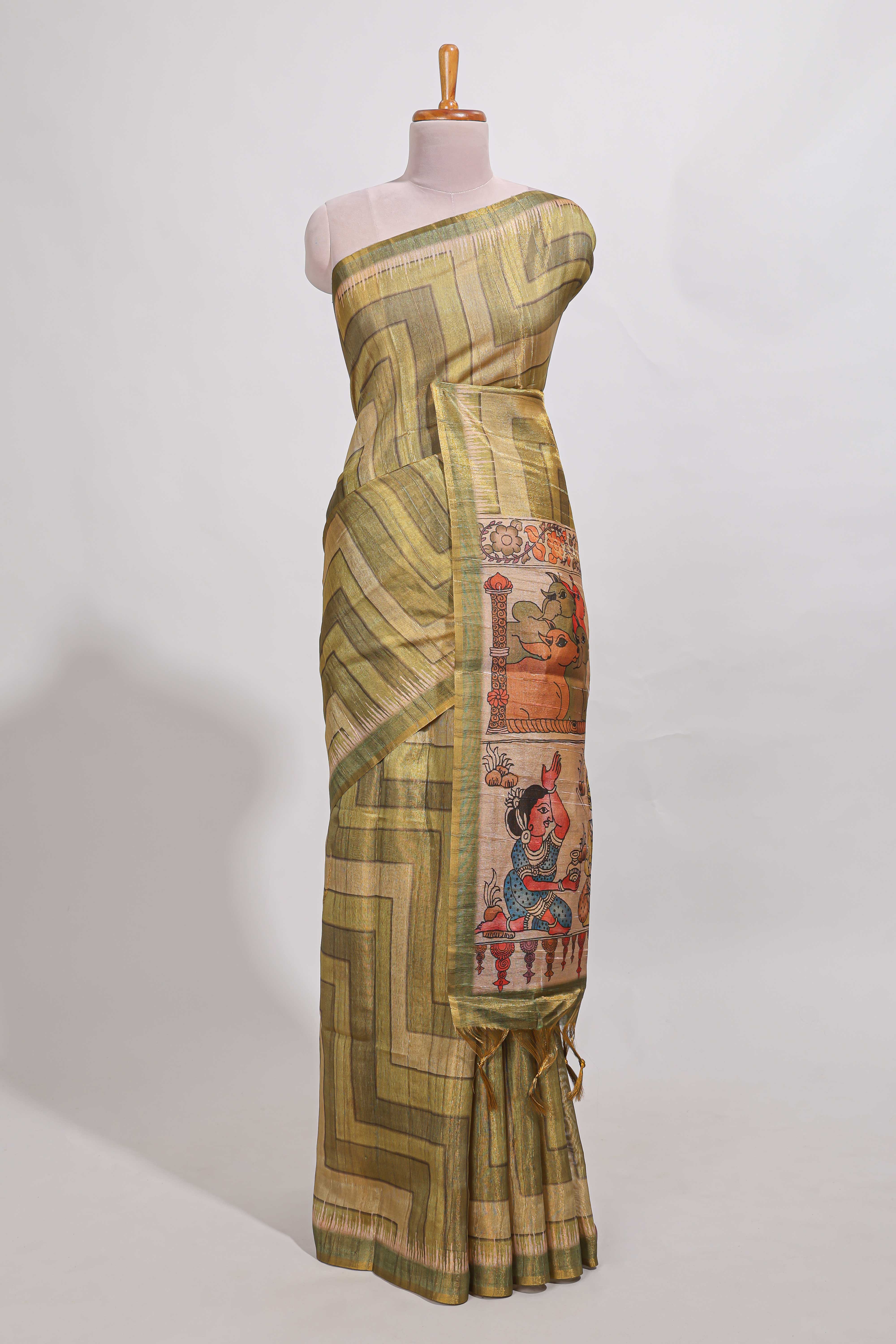 Olive greenabstract geometric pattern semi tussar saree with village art print pallu and tissue blouse