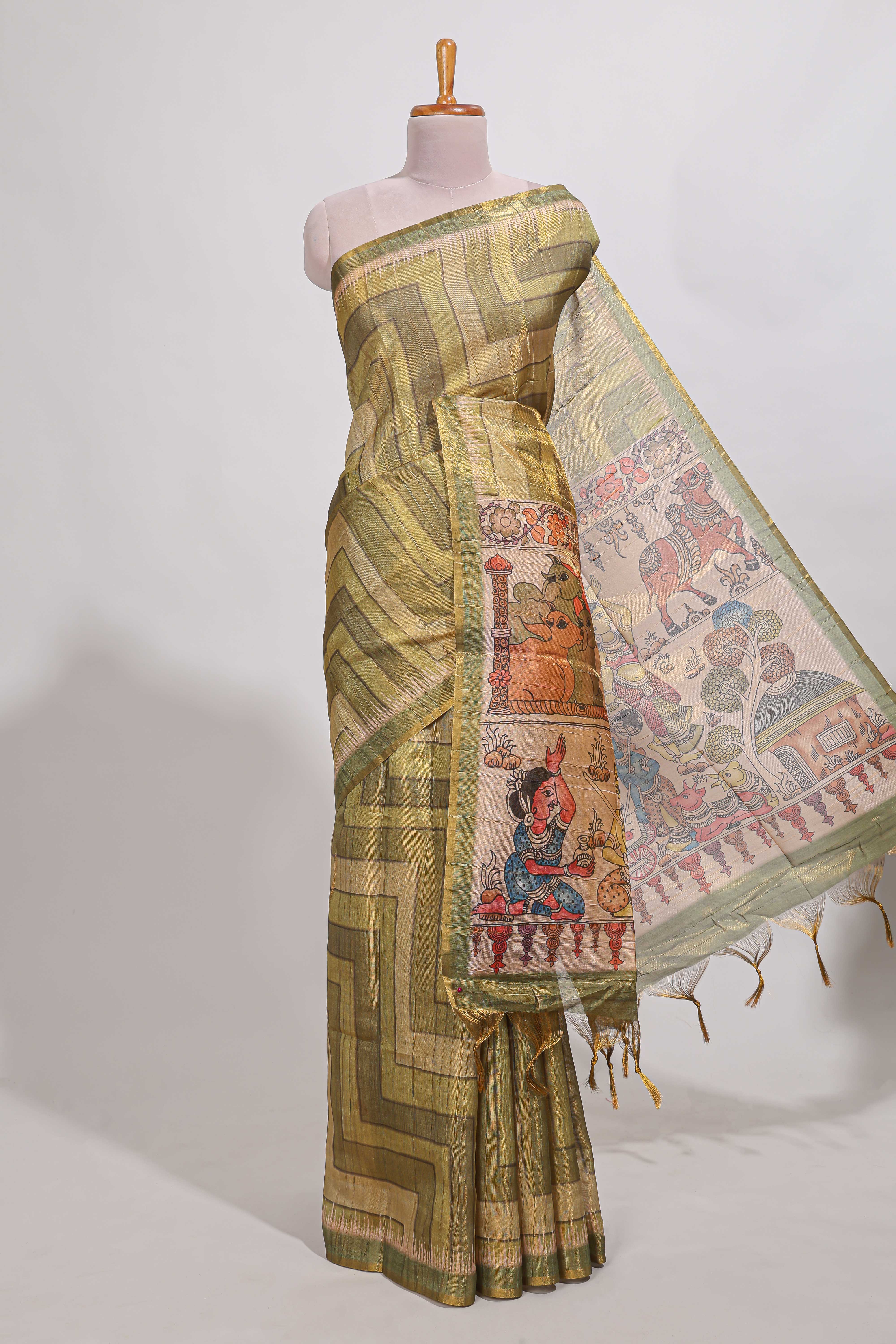 Olive greenabstract geometric pattern semi tussar saree with village art print pallu and tissue blouse