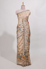 Beige colour artistic village art tussar saree with small border and matching pallu