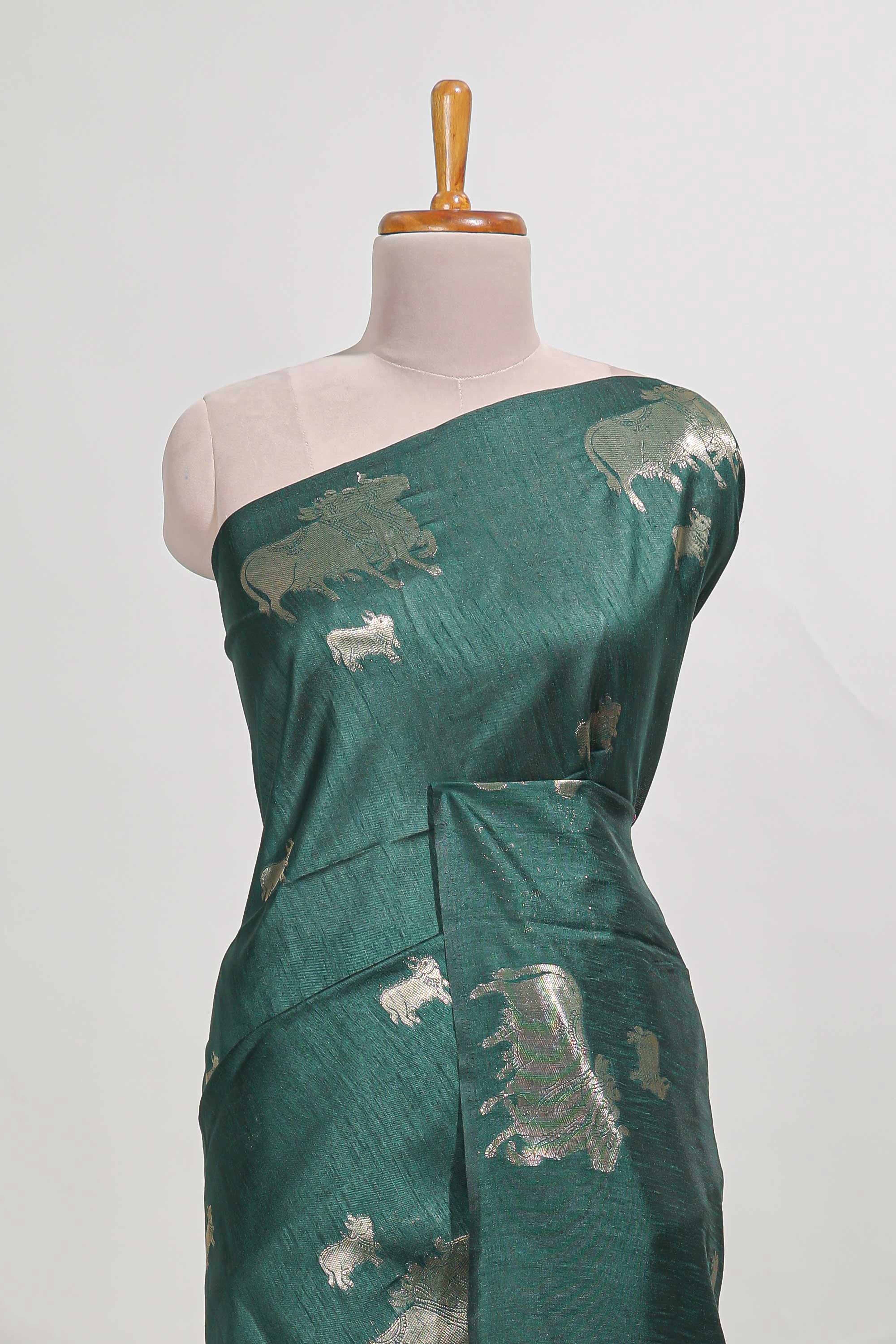 green tussar saree elephant inspired zari motifswithzari butta blouse and matching pallu