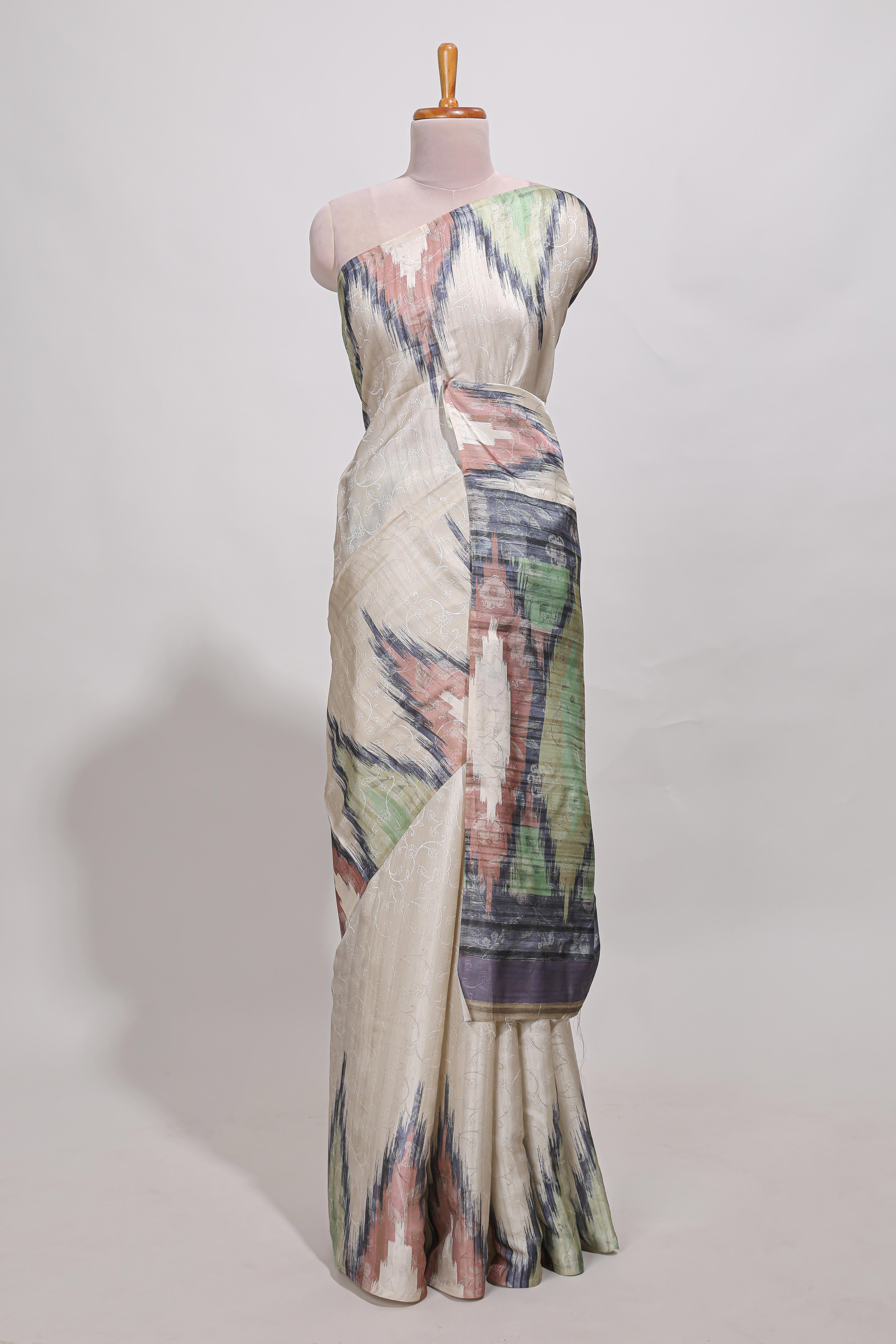 Off white ikkat print tussar saree pastel multi coloured ikkat patterns with matching blouse with matching pallu