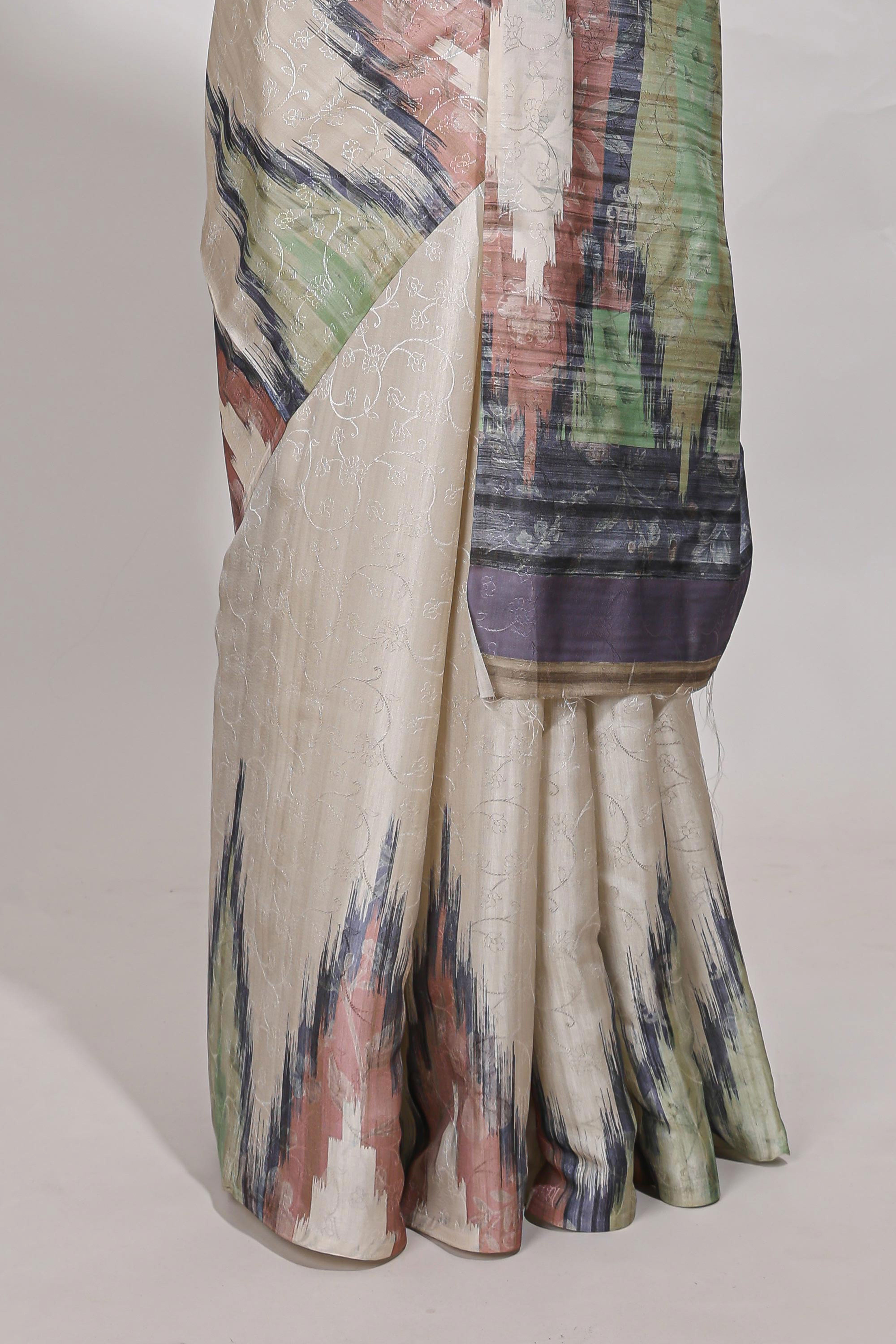Off white ikkat print tussar saree pastel multi coloured ikkat patterns with matching blouse with matching pallu