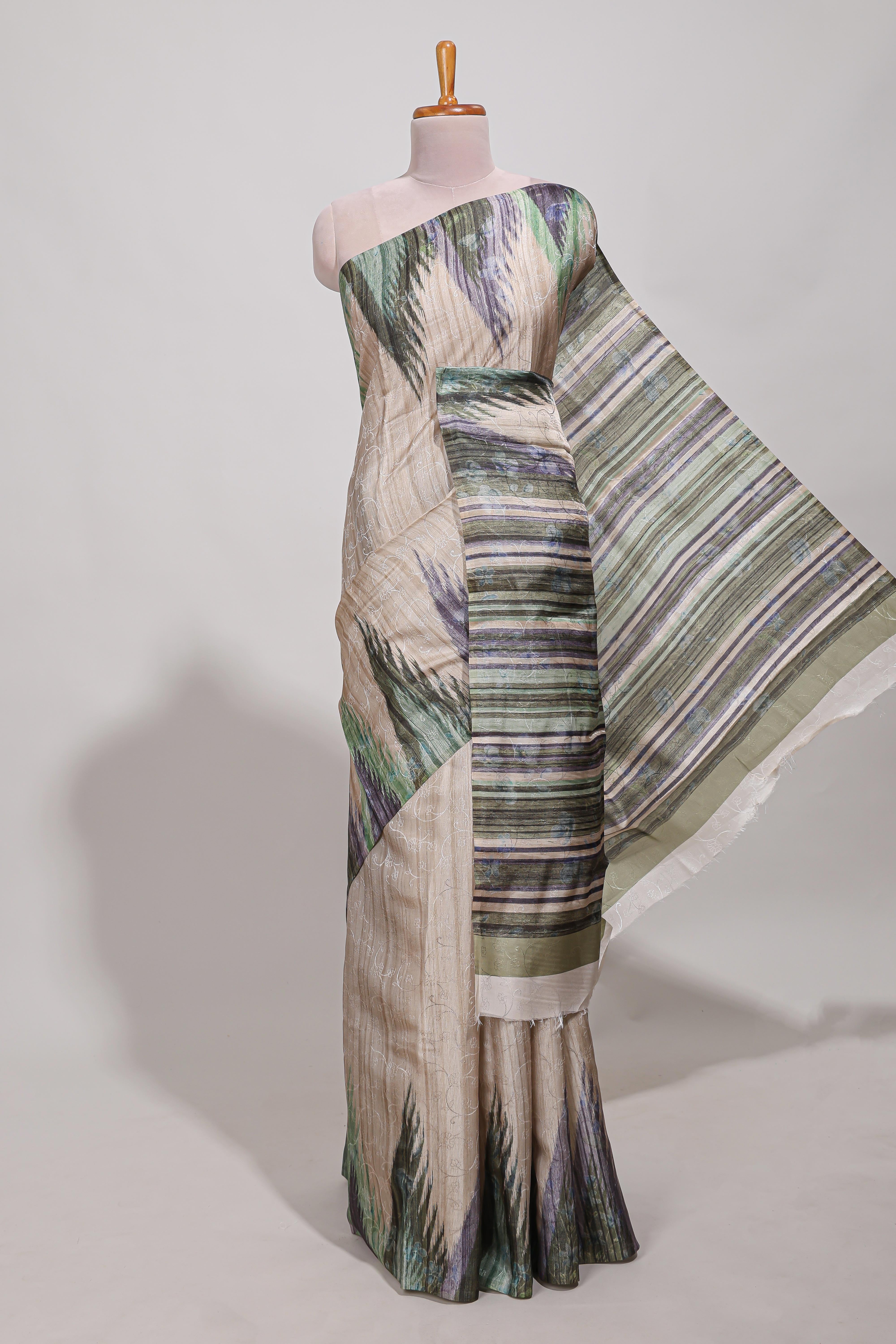 Green ikkat print tussar saree pastel multi coloured ikkat patterns with matching blouse with matching pallu
