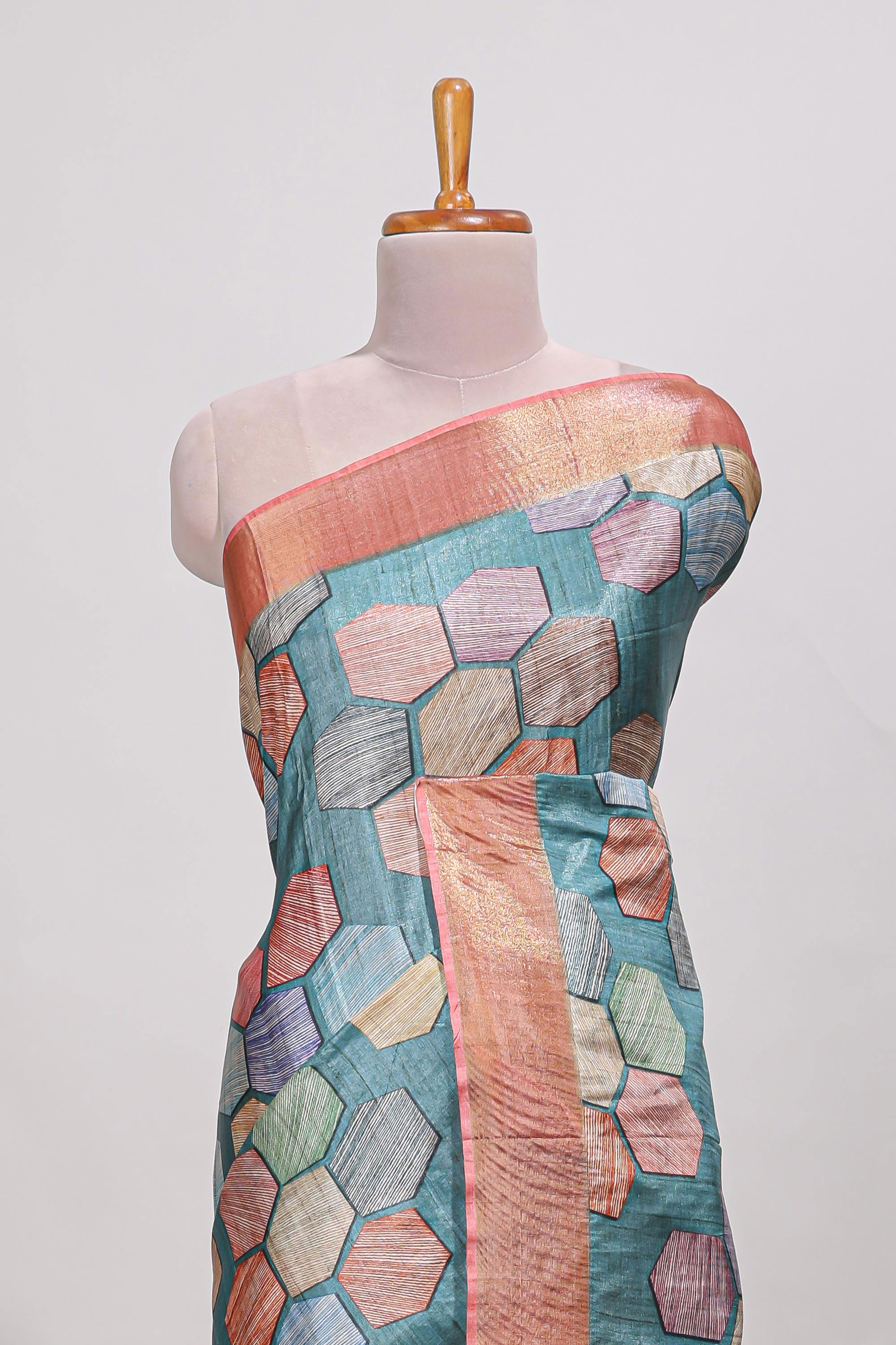 Sea green geometrical tussar silk saree multi coloured honeycomb geomatricpatterns ,rich matching pallu along with tussles