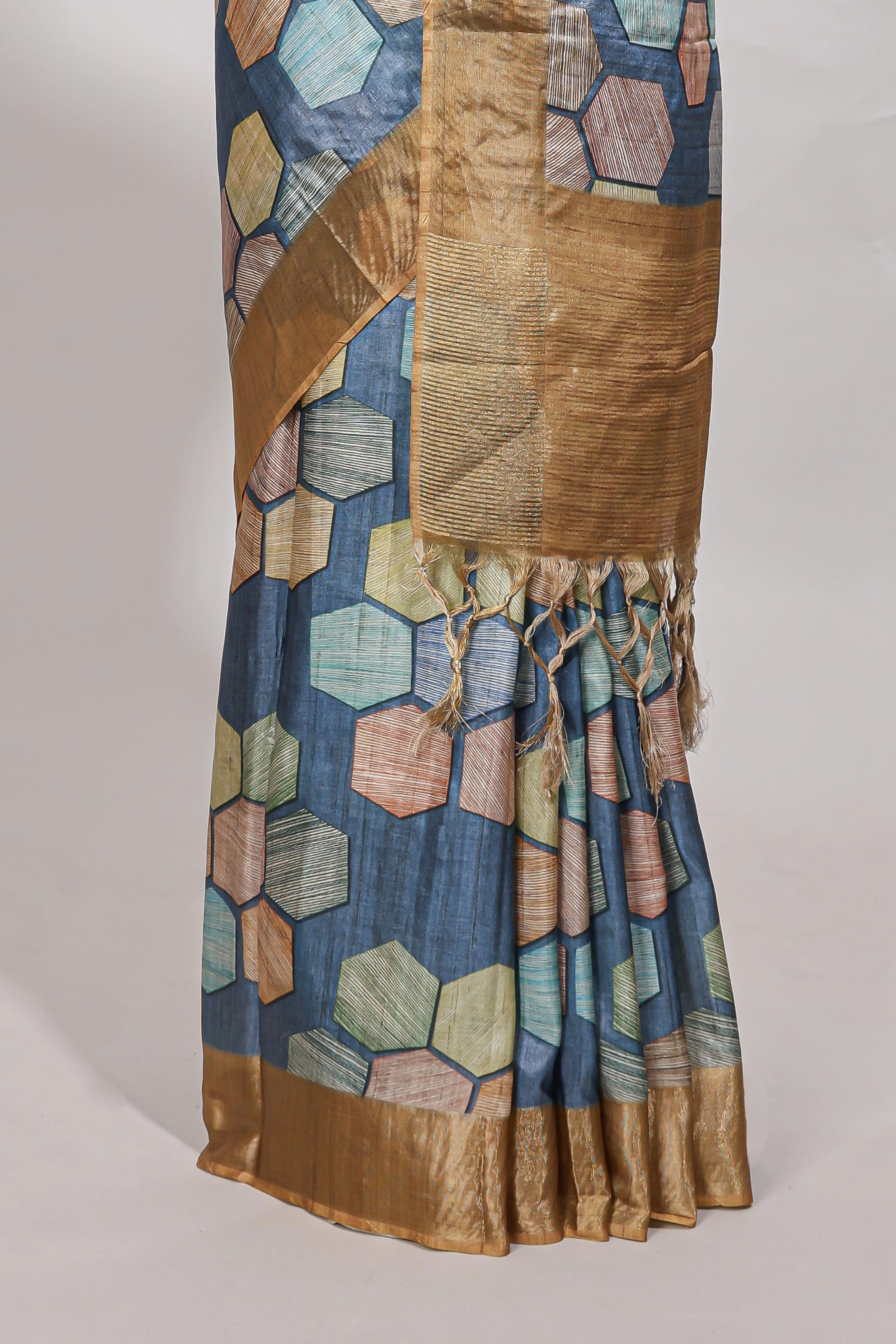 Blue geometrical tussar silk saree multi coloured honeycomb geomatricpatterns ,rich matching pallu along with tassles