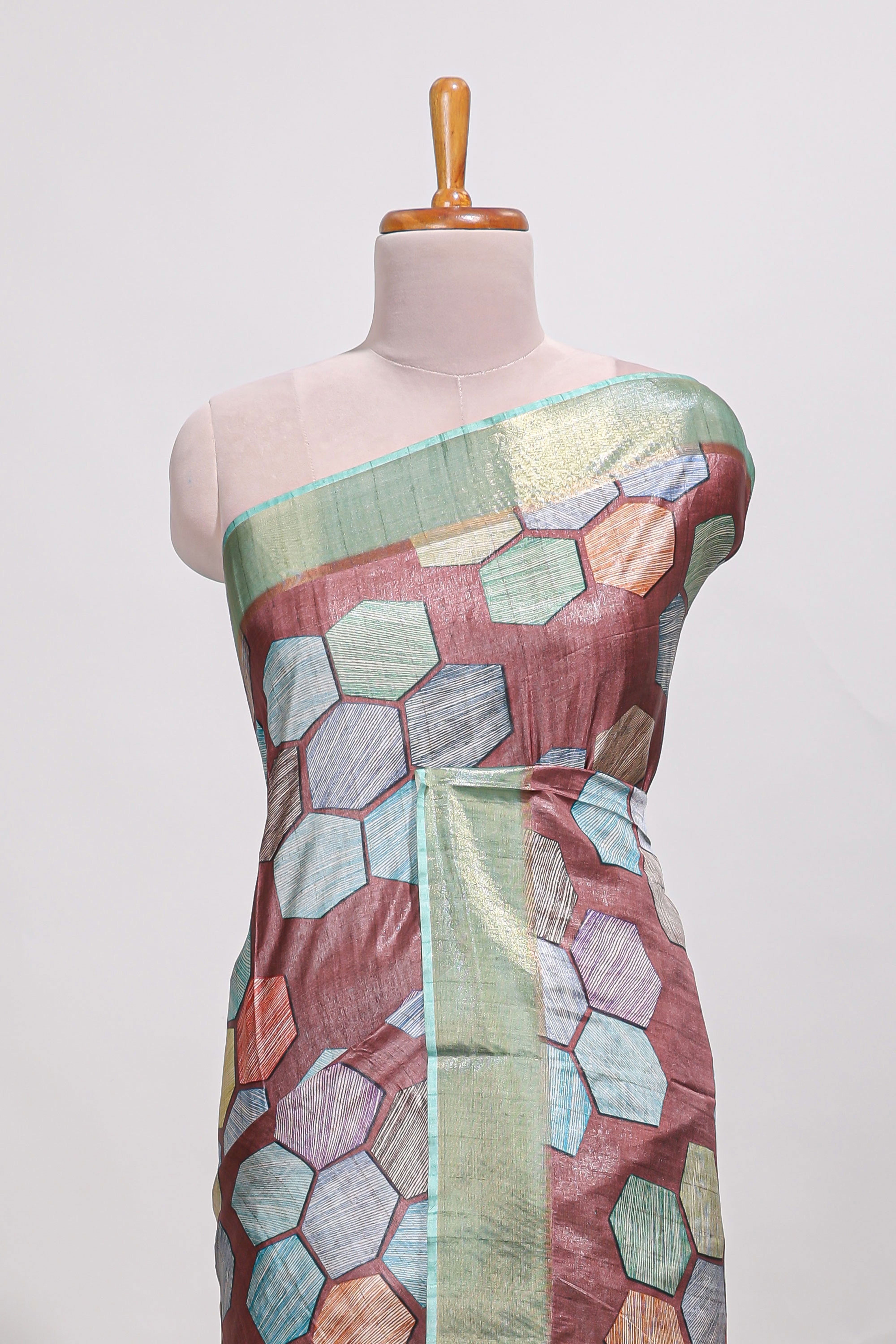 Brick red geometrical tussar silk saree multi coloured honeycomb geomatricpatterns ,rich matching pallu along with tassles