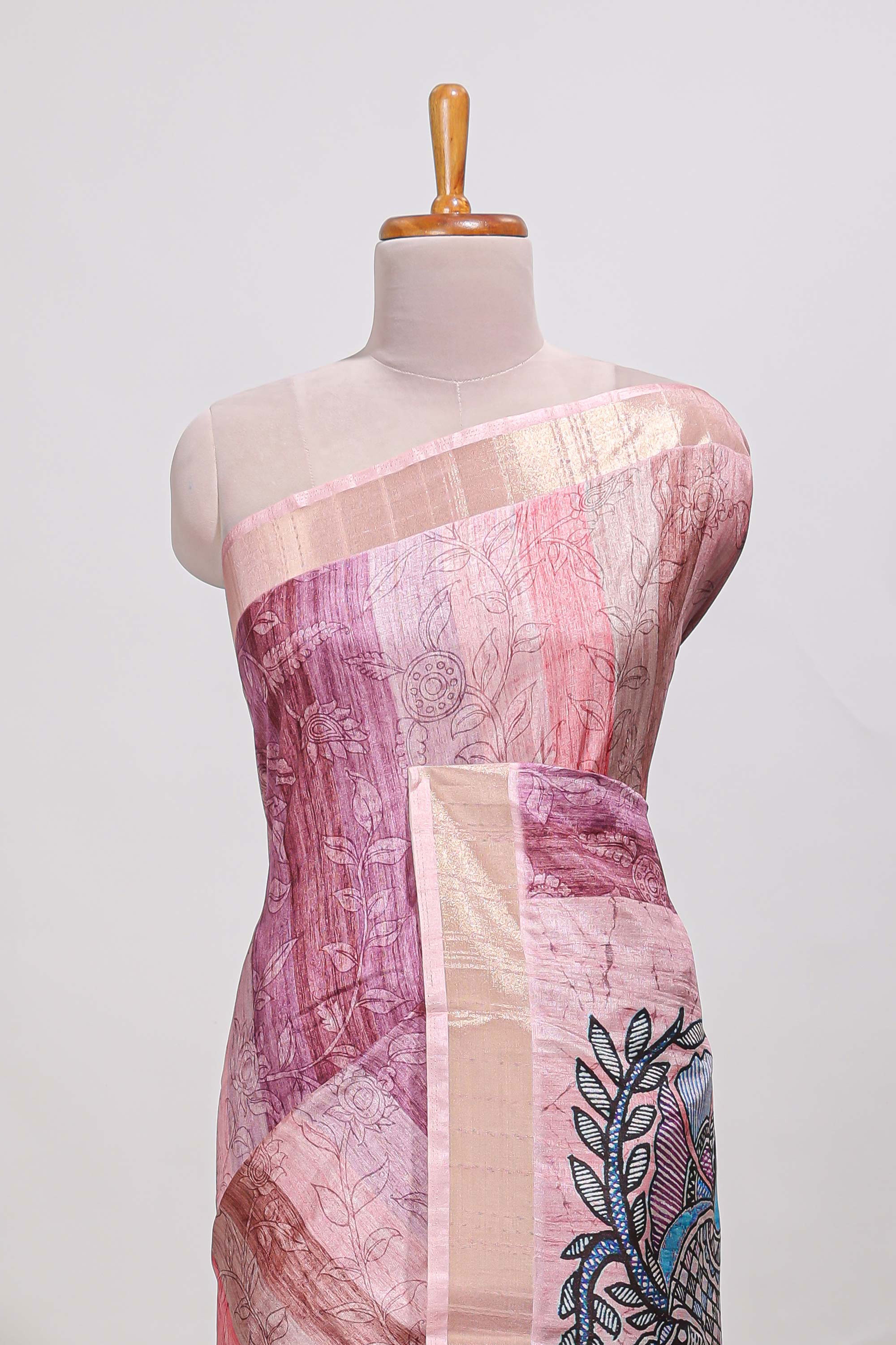 Onion pink kalamakri tussar saree body with floral creeper prints zari border and kalamkari peacock motif print pallu