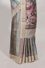 Multi colour kalamakri tussar saree body with floral creeper prints zari border and kalamkari peacock motif print pallu