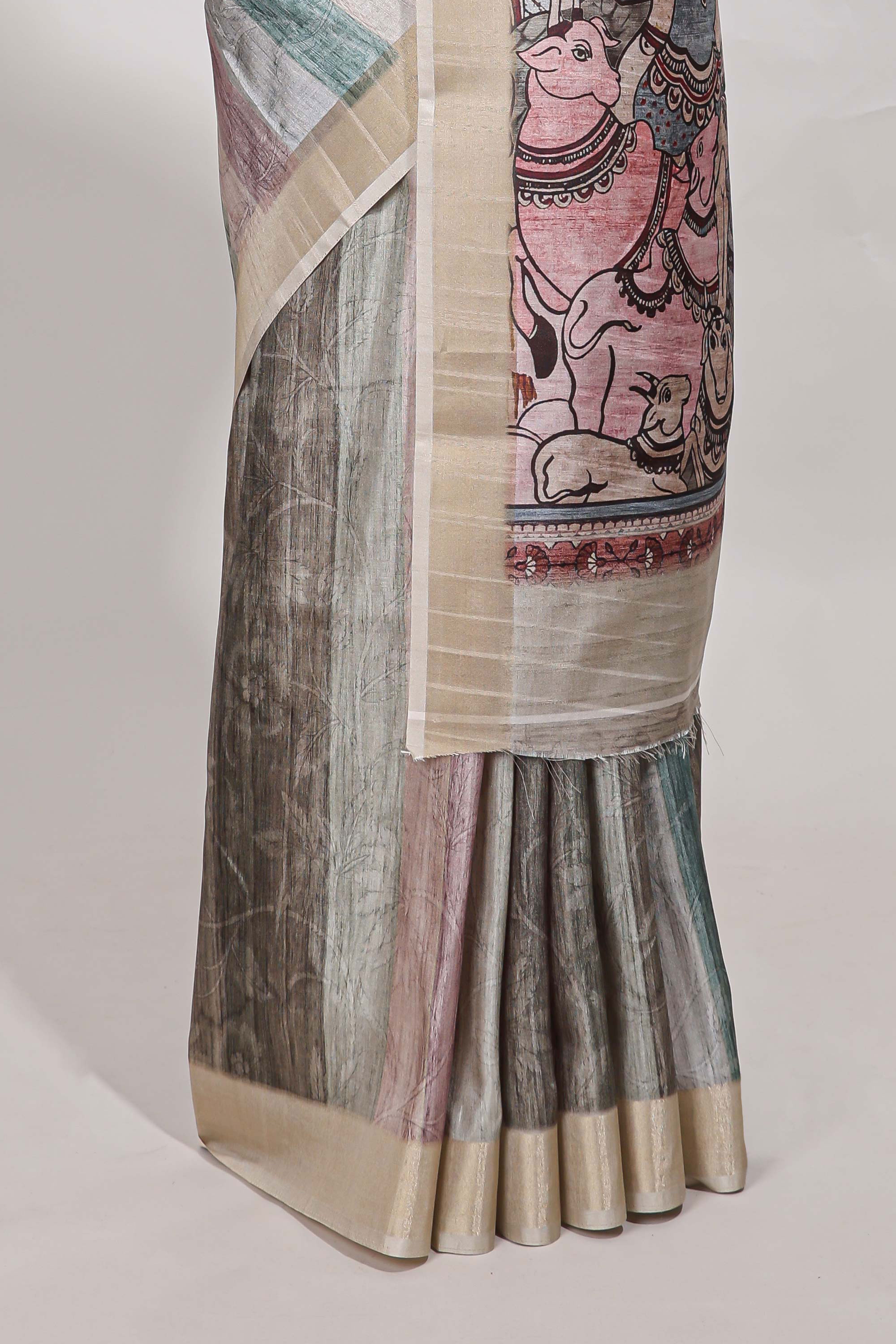 Multi colour kalamakri tussar saree body with floral creeper prints zari border and kalamkari peacock motif print pallu