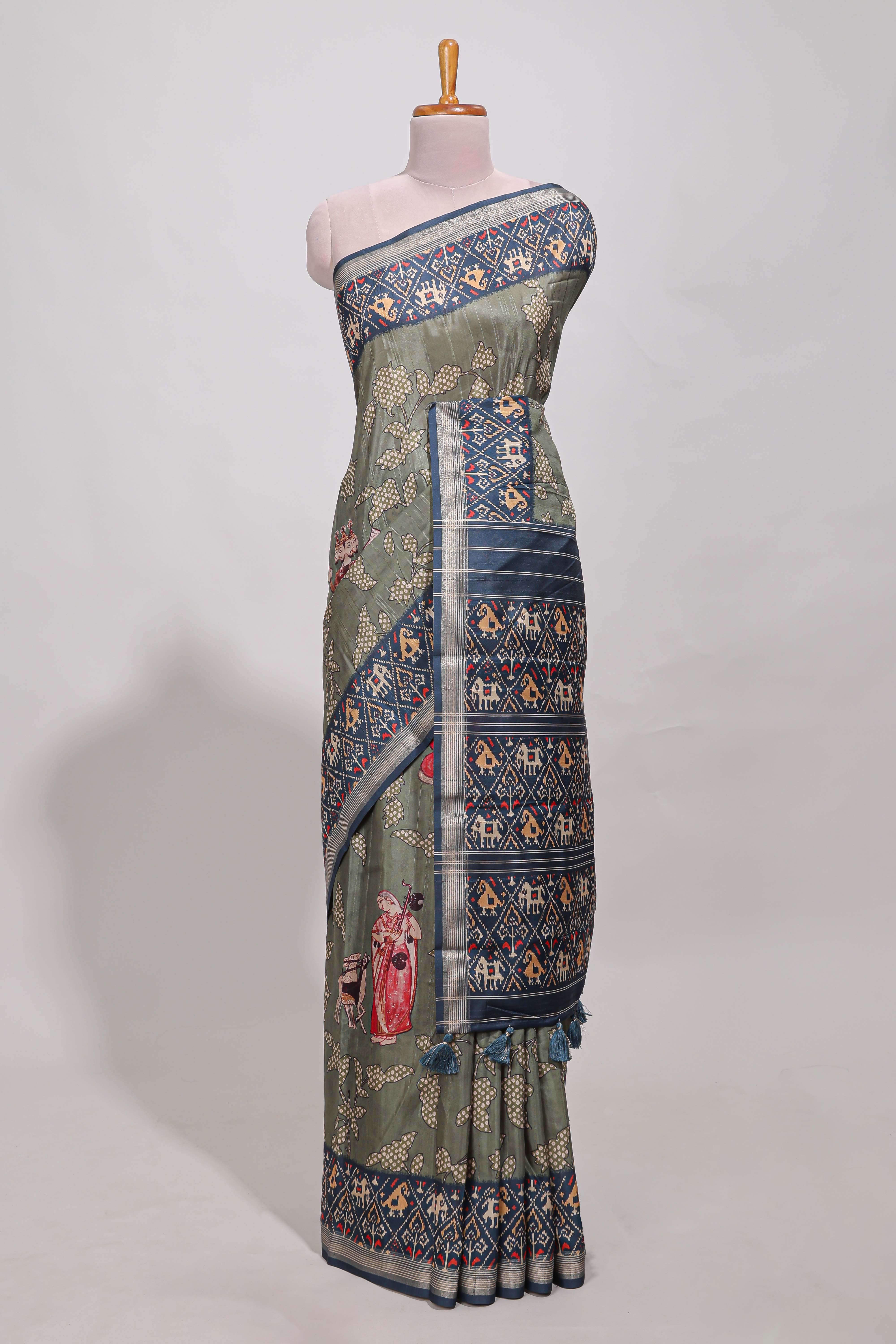 Olive green patola and pichwai tussar saree zari bordergeomatricmatching pallu along with tussels